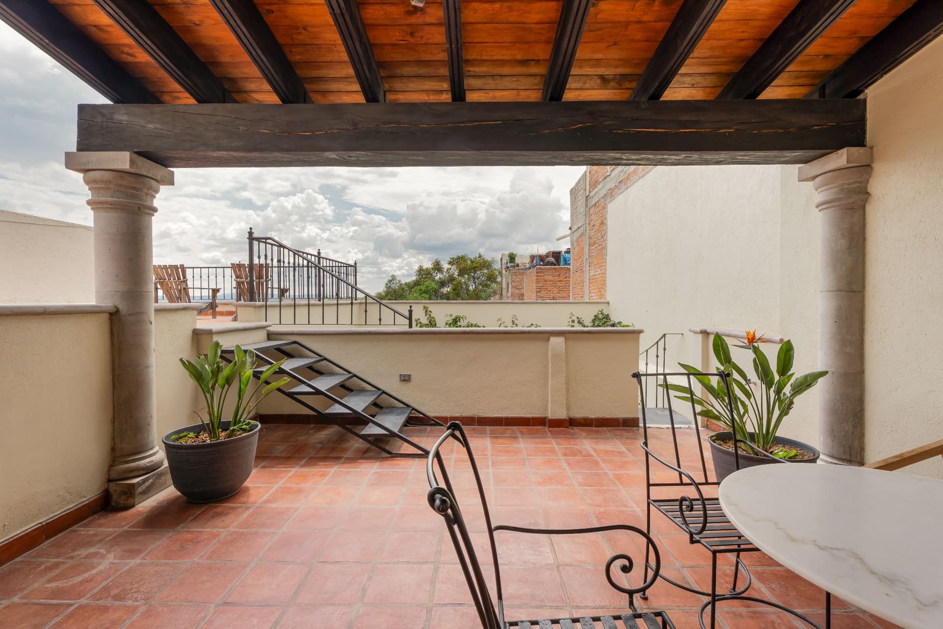 Rooftop terrace at Casa Sobremesa with mountain views