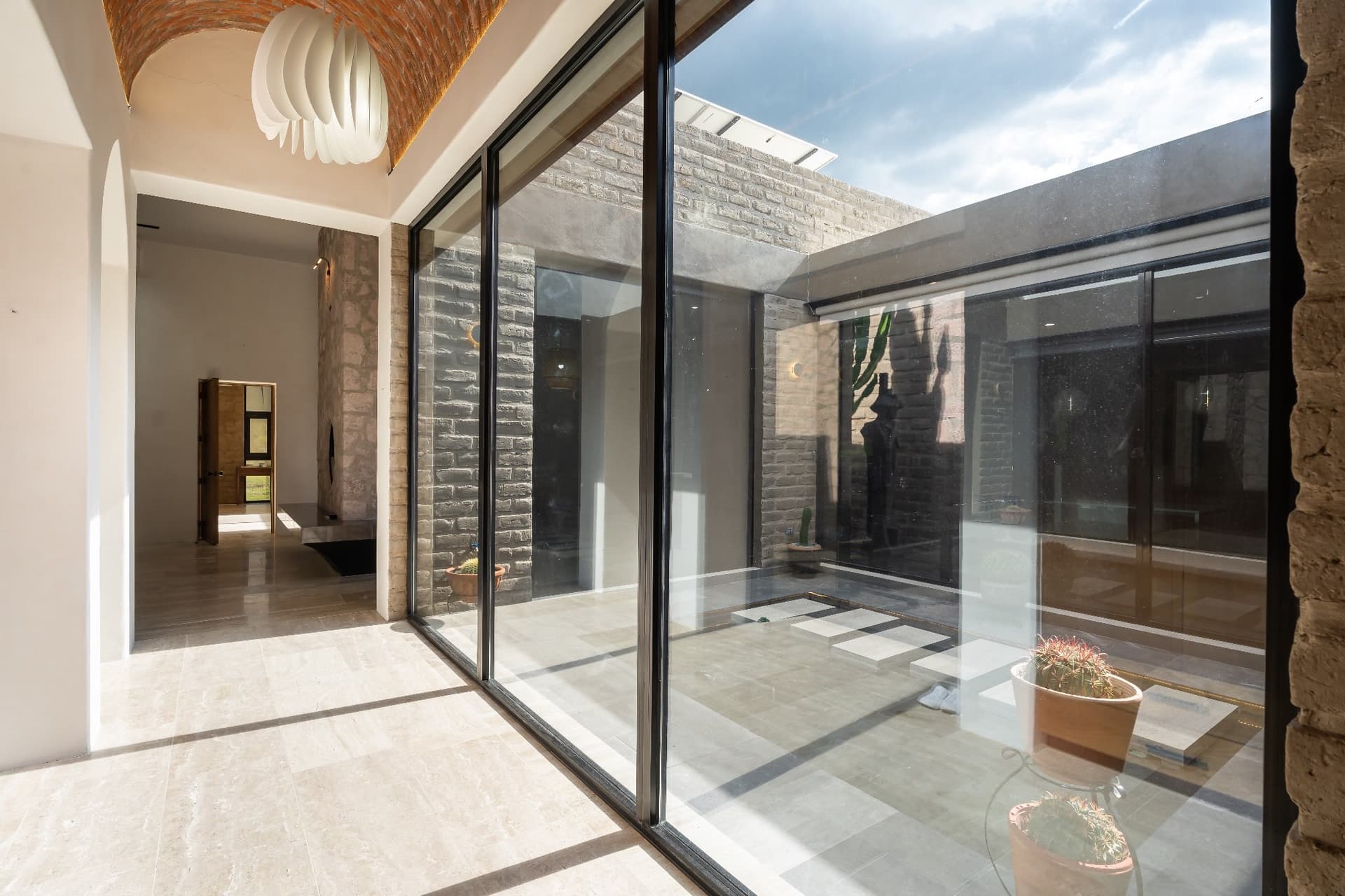 Courtyard at Santuario Eco-Cielo with indoor-outdoor living space