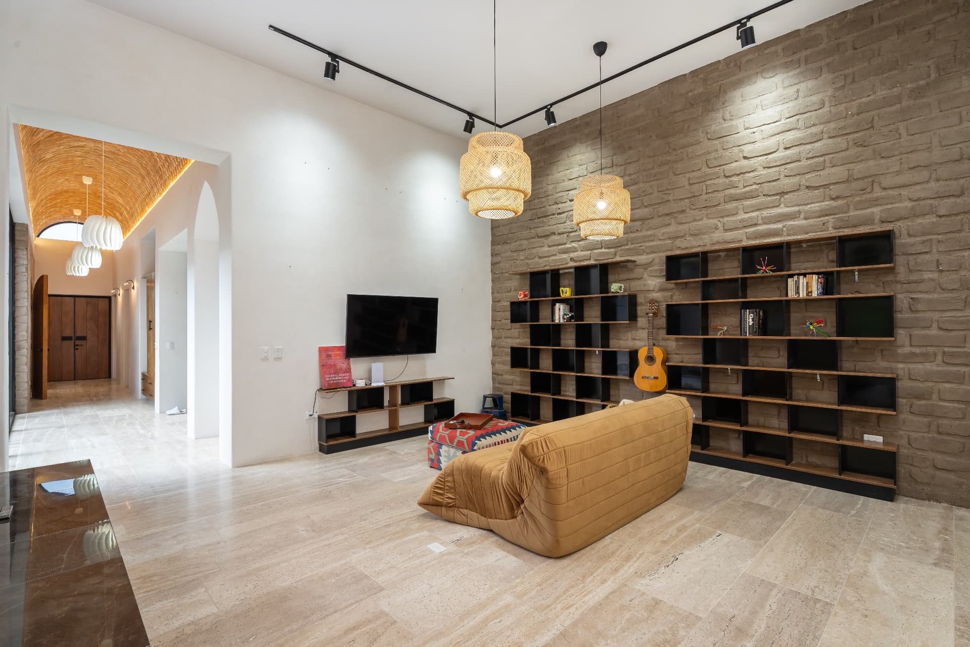 Living room at Santuario Eco-Cielo with soaring ceilings and mountain views
