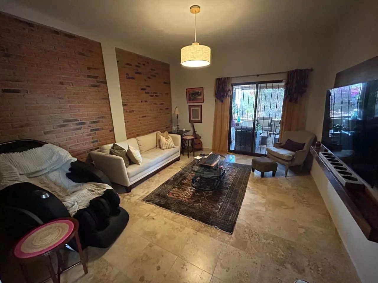 Premium Country Estate Sosnabar — Sosnabar, San Miguel de Allende — photo 27 — spacious living room, warm brick character