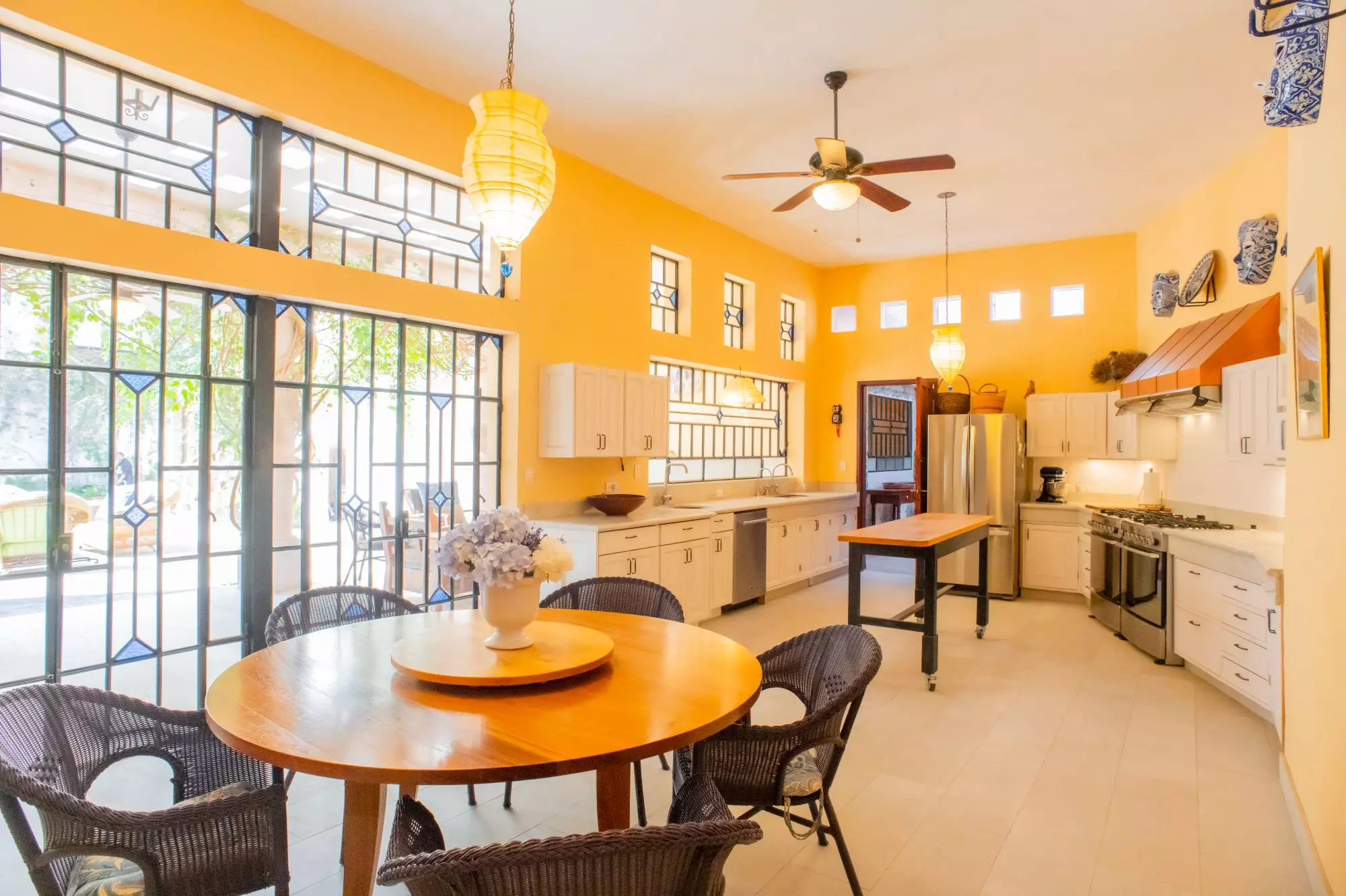Casa Grande — Centro, San Miguel de Allende — photo 4 — radiant yellow kitchen, abundant natural light