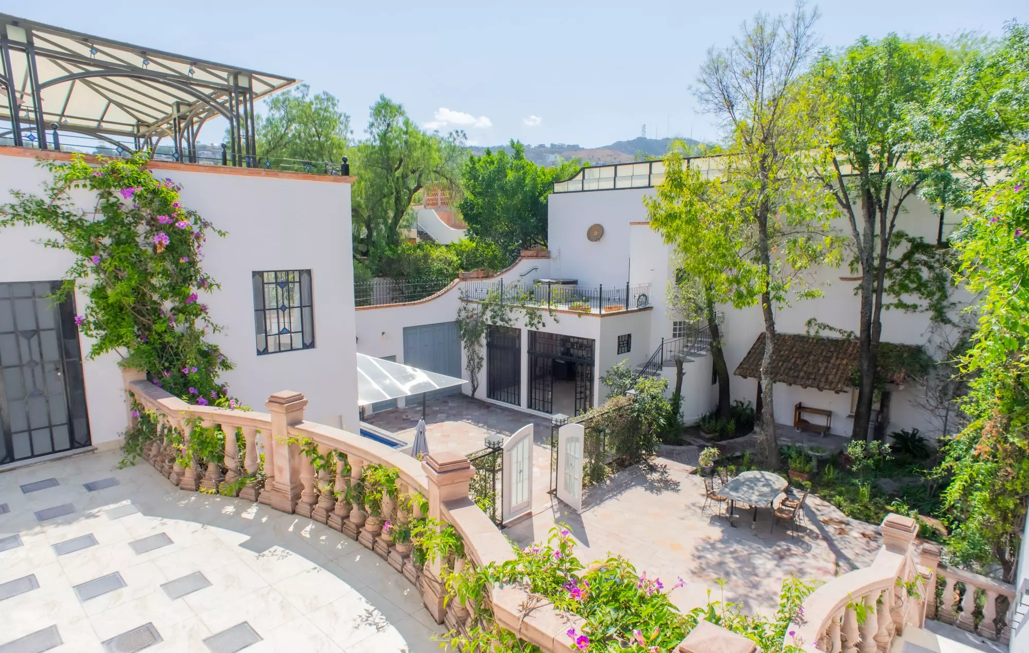 Casa Grande — Centro, San Miguel de Allende — photo 6 — enchanting courtyard, cascading terraces, vibrant gardens