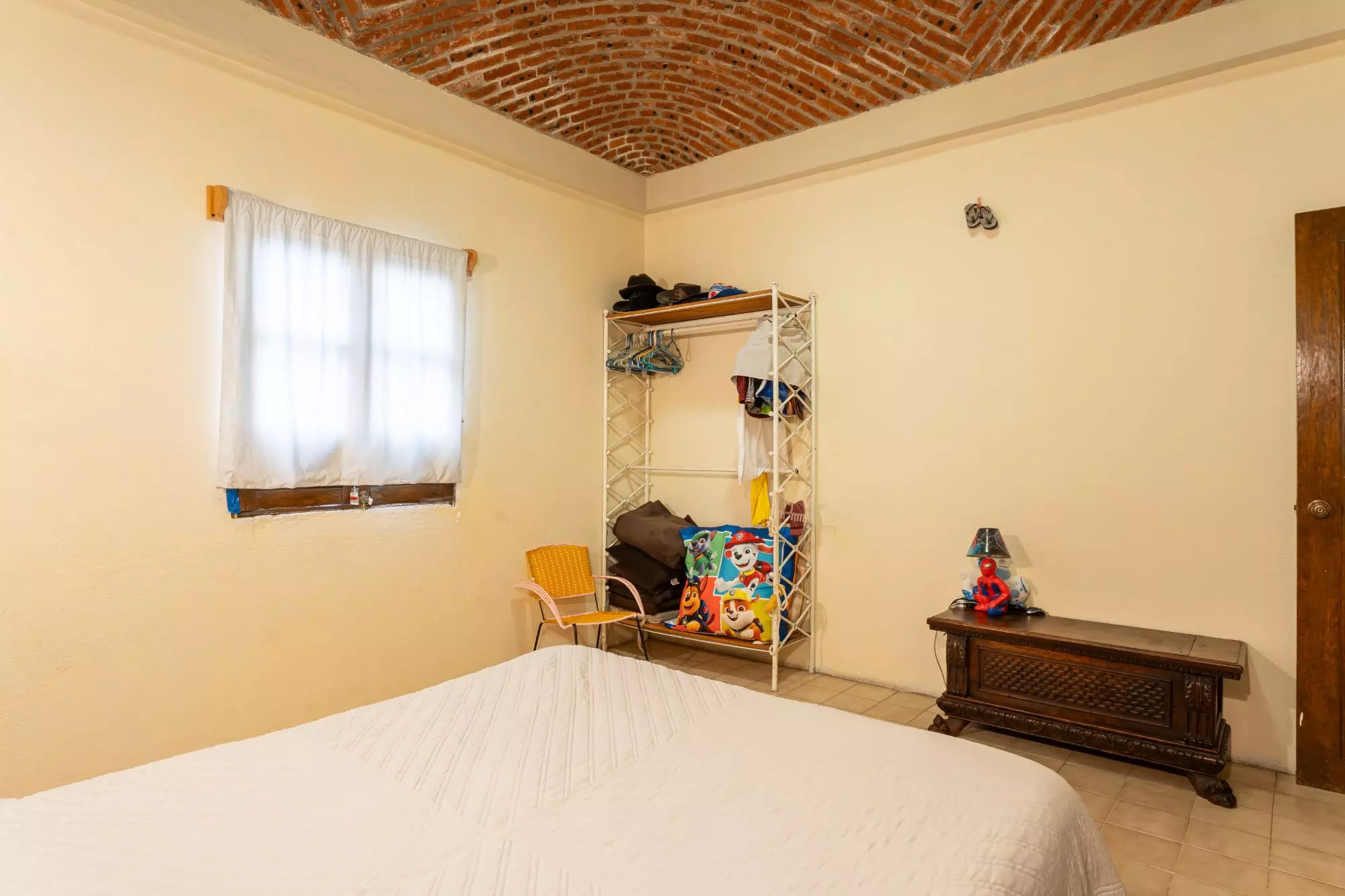 Aurora 30 — Aurora, San Miguel de Allende — photo 17 — charming bedroom, rustic brick ceiling, abundant natural light