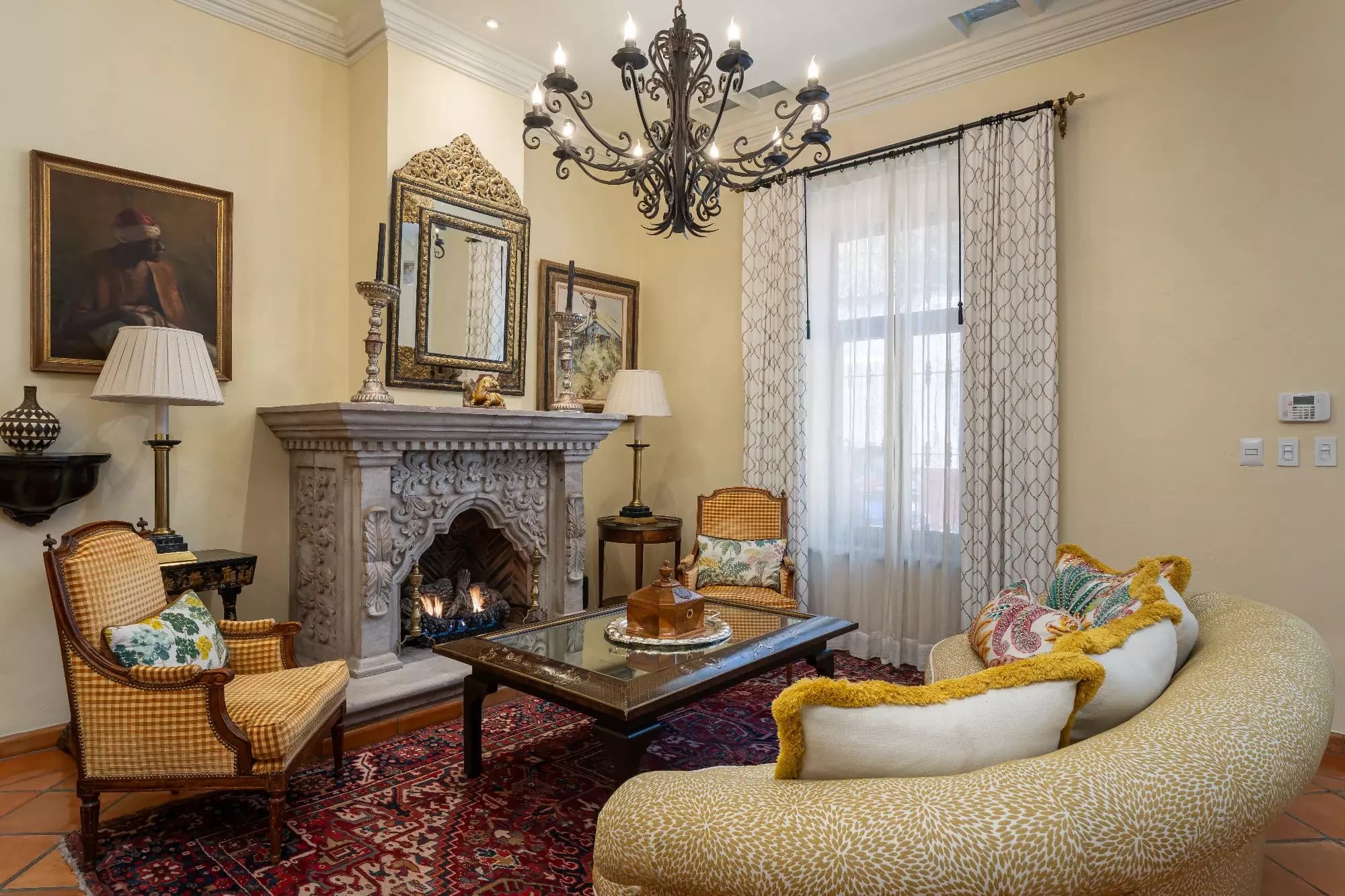 Casa Relox — Centro, San Miguel de Allende — photo 5 — elegant formal living, fireplace warmth, refined
