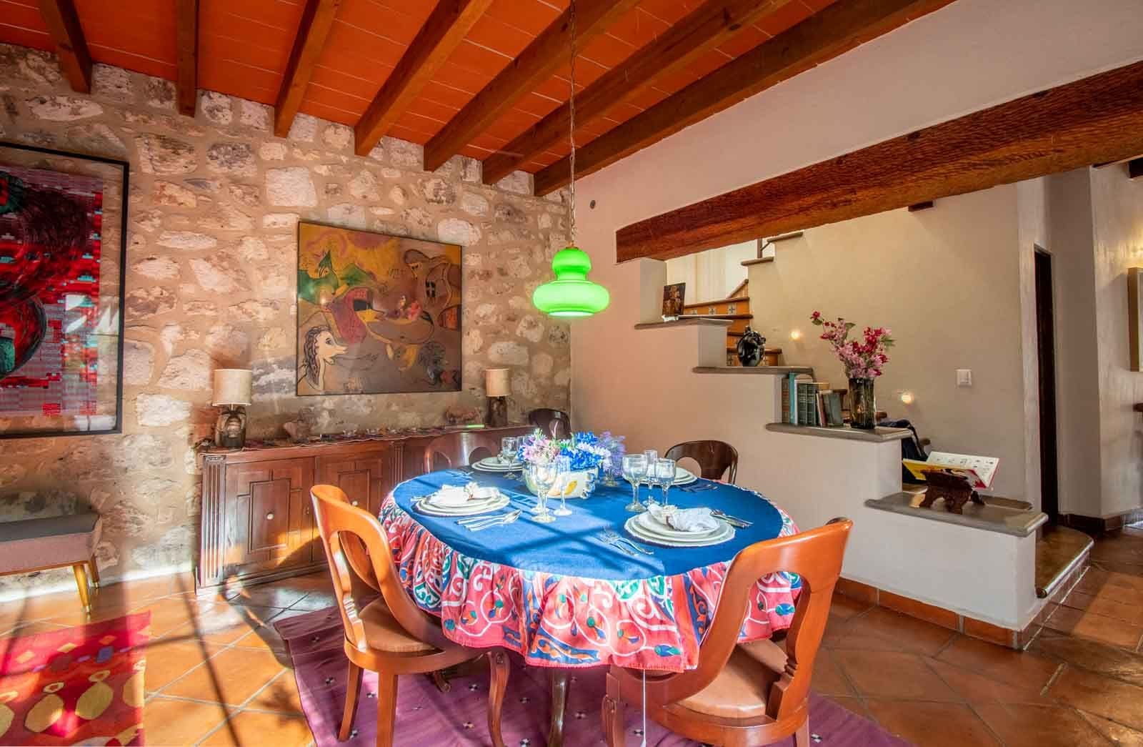Casa San Miguel 11 — El Paraiso, San Miguel de Allende — photo 6 — vibrant dining room, rustic stone charm