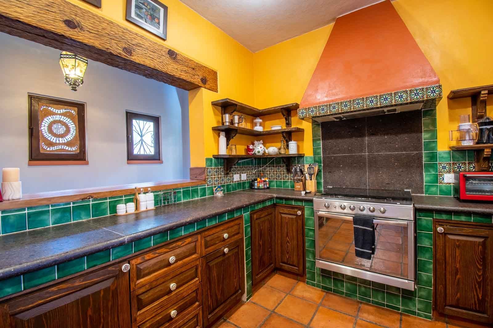 Casa San Miguel 11 — El Paraiso, San Miguel de Allende — photo 9 — vibrant traditional mexican kitchen elegance
