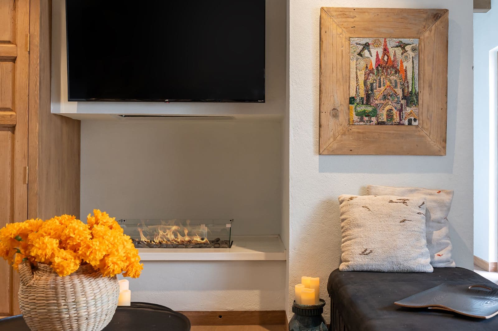 Le Cottage Penthouse #9 — Centro, San Miguel de Allende — photo 10 — contemporary fireplace lounge with curated art
