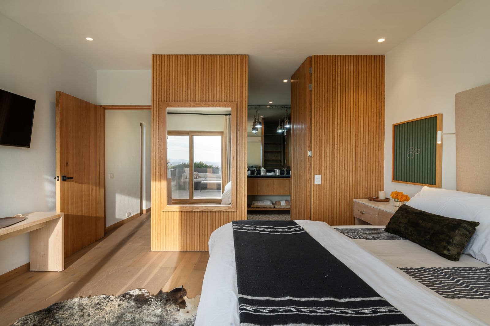 Le Cottage Penthouse #9 — Centro, San Miguel de Allende — photo 18 — modern wood-accented master suite