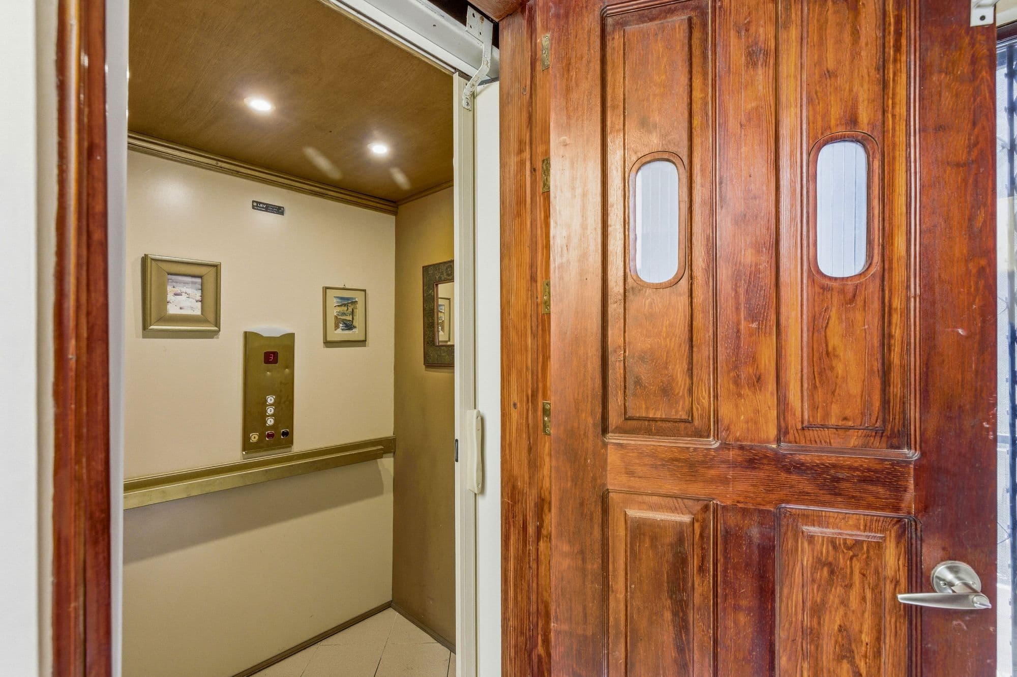 Casa Arie — Caracol, San Miguel de Allende — photo 18 — historic wooden doors, vintage elevator charm