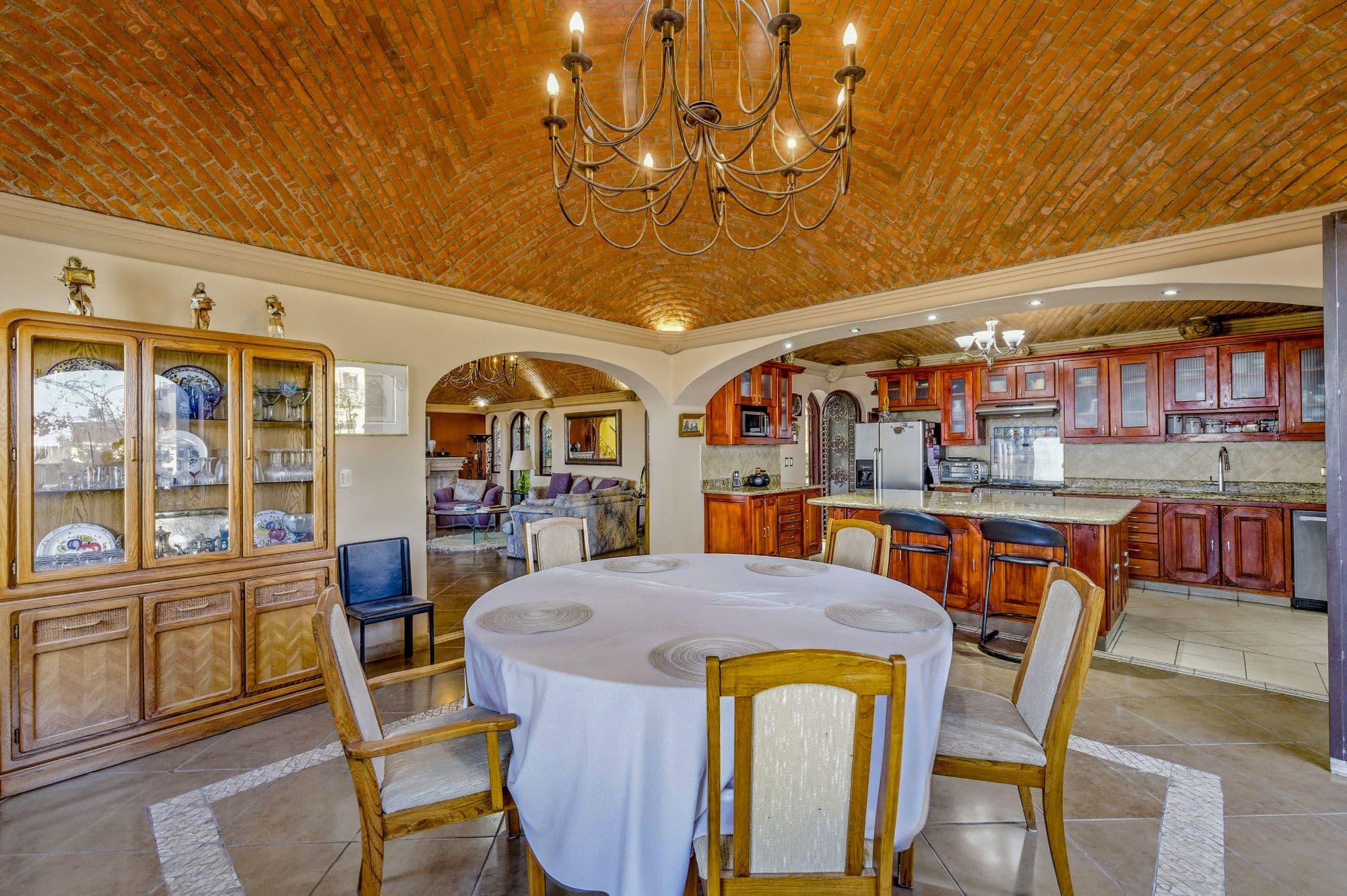 Casa Arie — Caracol, San Miguel de Allende — photo 2 — elegant entertaining with soaring brick ceiling