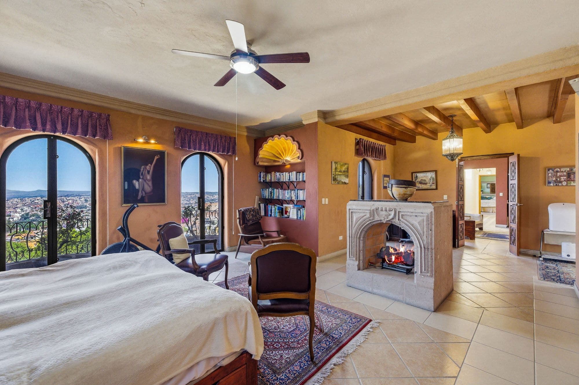 Casa Arie — Caracol, San Miguel de Allende — photo 13 — panoramic master suite with fireside luxury