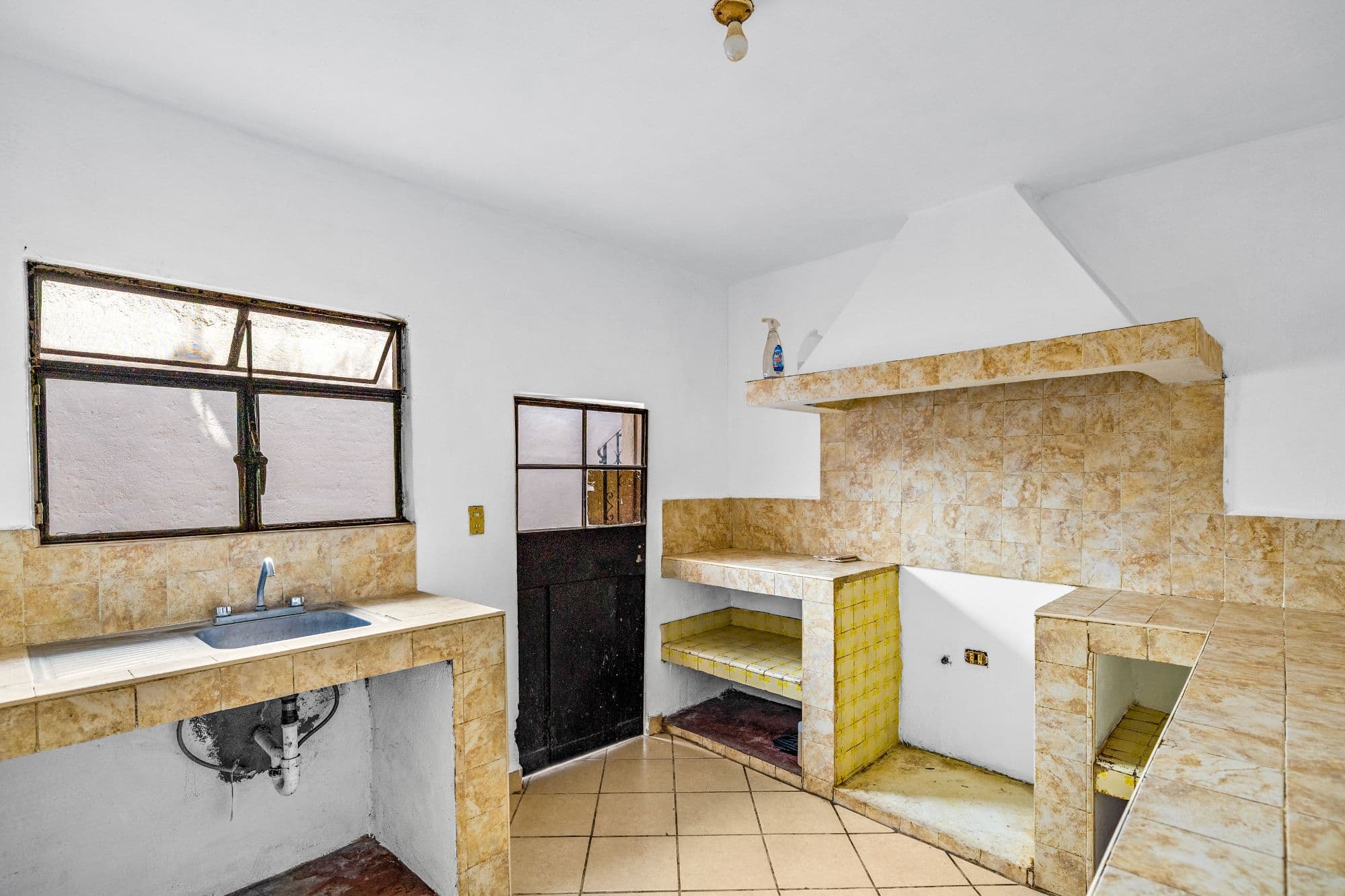 Casa Arias — La Palmita, San Miguel de Allende — photo 6 — charming rustic kitchen with authentic character