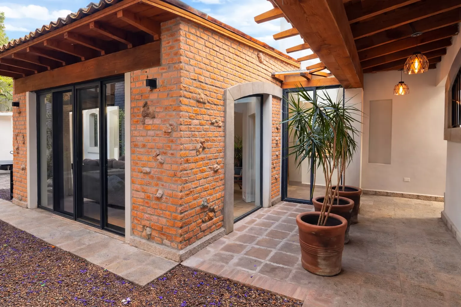 Casa Tranquila — Guadalupe, San Miguel de Allende — photo 17 — charming courtyard with rustic brick elegance