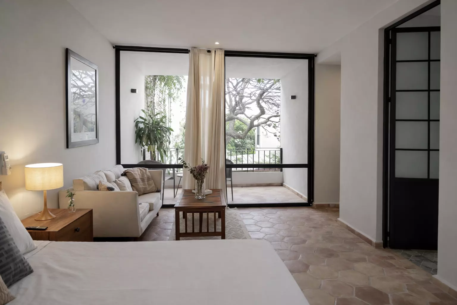 Casa Tranquila — Guadalupe, San Miguel de Allende — photo 8 — luminous suite with tree-framed views