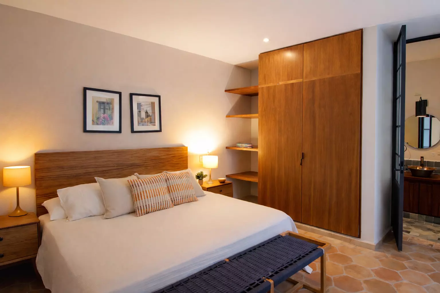 Casa Tranquila — Guadalupe, San Miguel de Allende — photo 18 — sophisticated wooden bedroom, warm ambient lighting