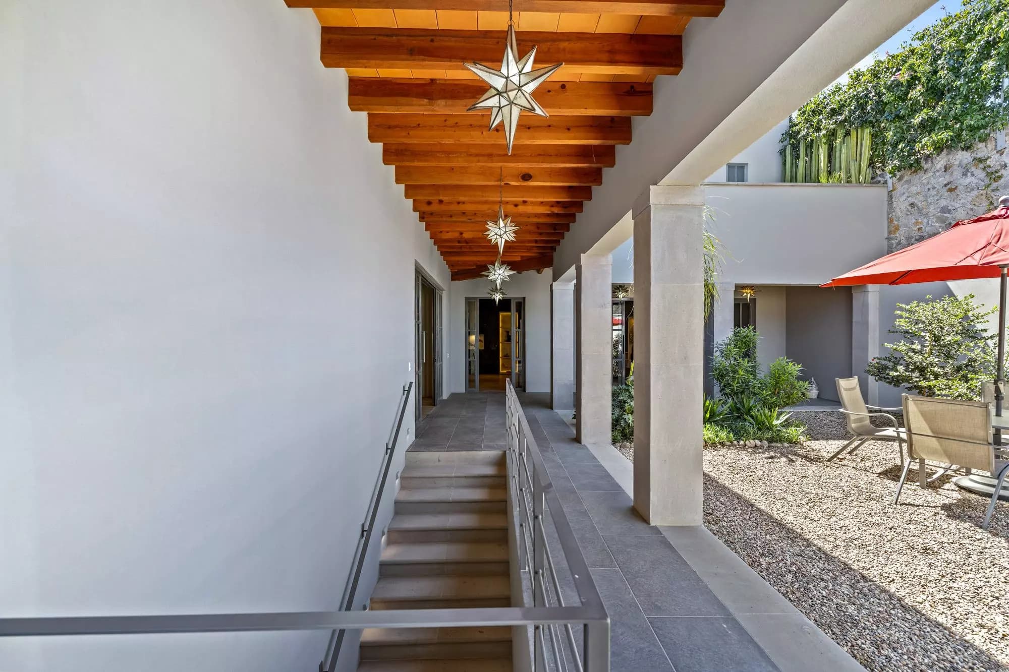 Casa San Uriel — El Paraiso, San Miguel de Allende — photo 7 — elegant covered passageway, rustic-modern architectural charm