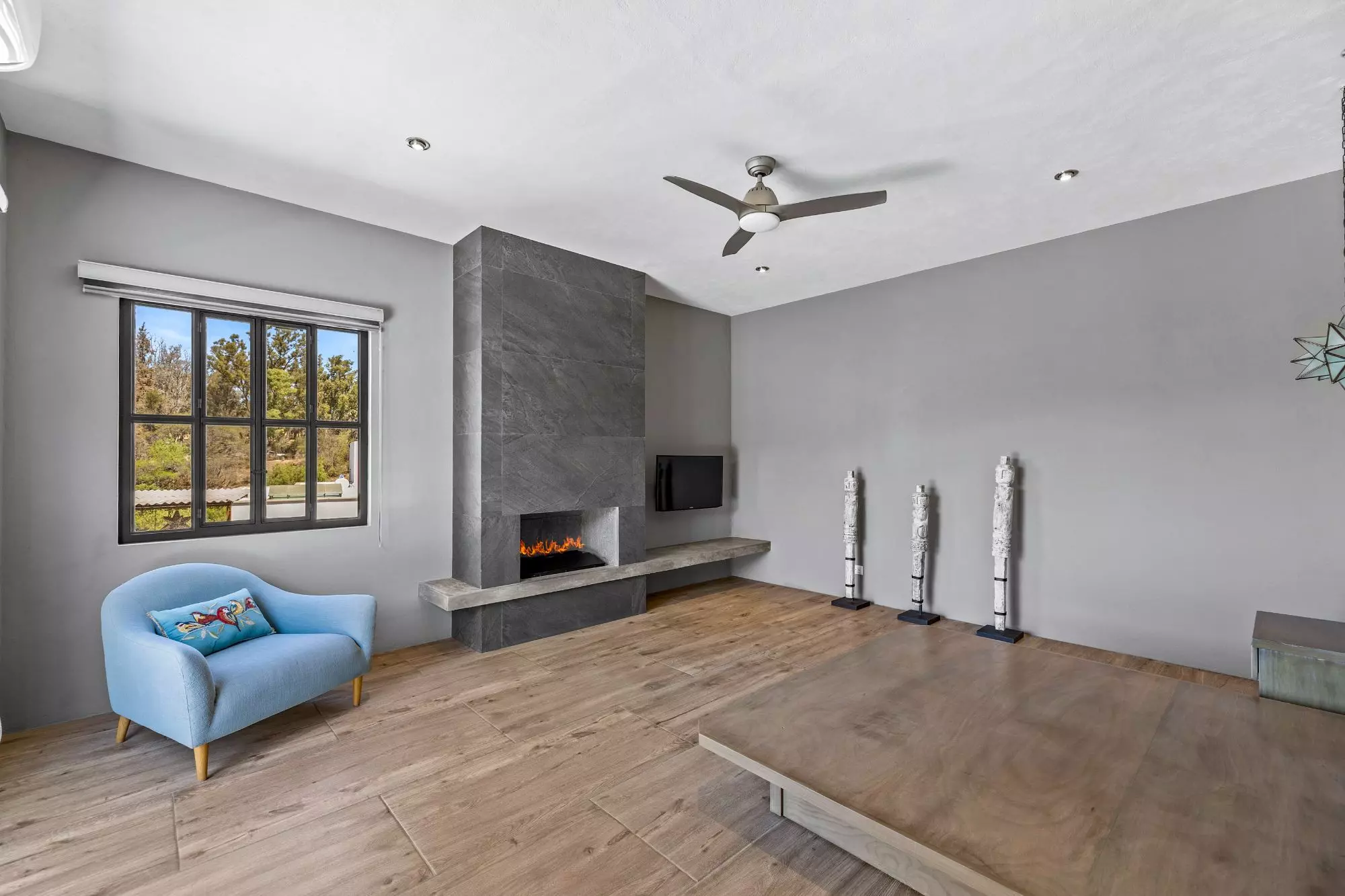 Casa San Uriel — El Paraiso, San Miguel de Allende — photo 20 — contemporary living room, designer fireplace, abundant natural light