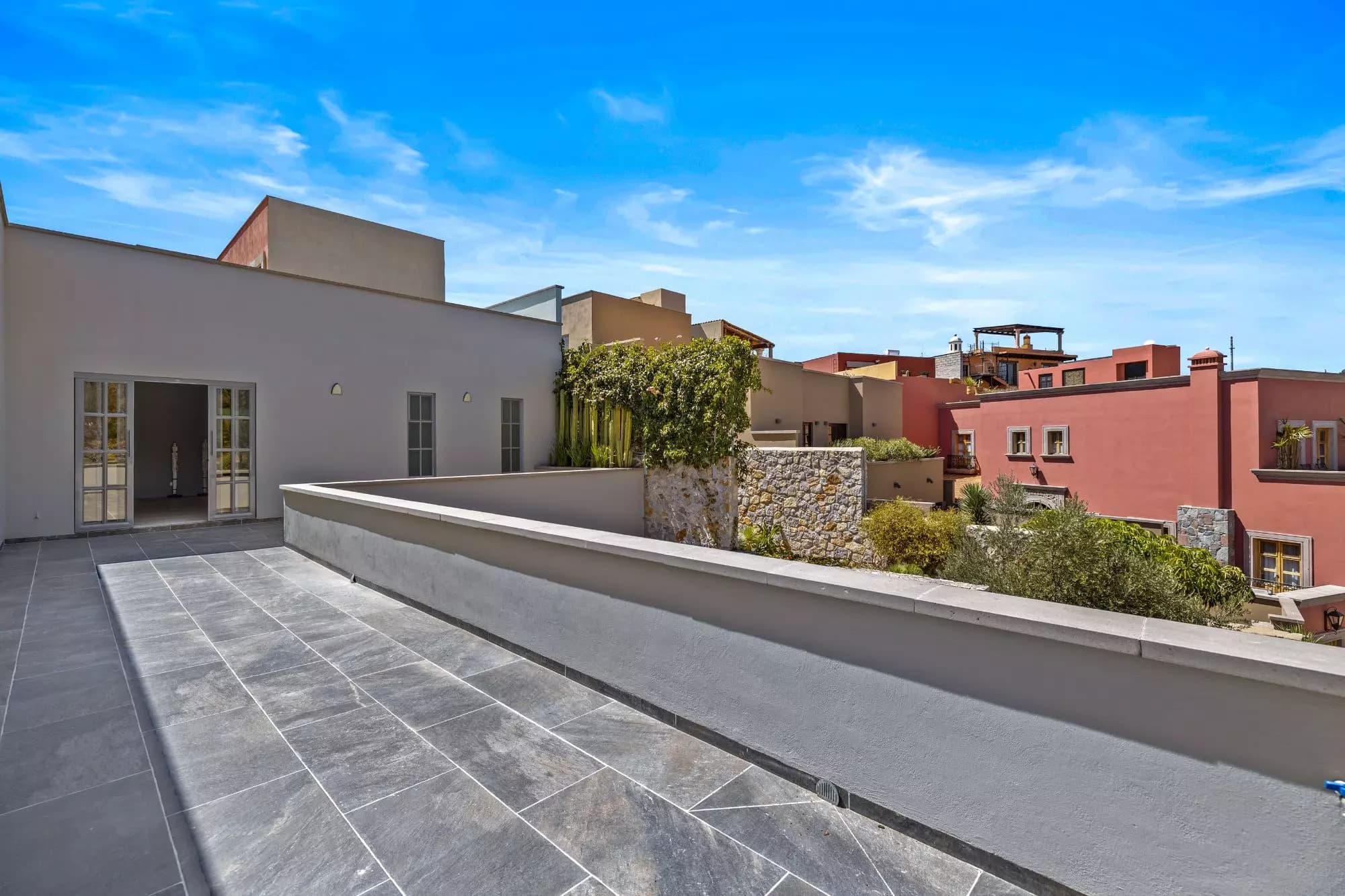 Casa San Uriel — El Paraiso, San Miguel de Allende — photo 25 — expansive rooftop terrace, architectural elegance