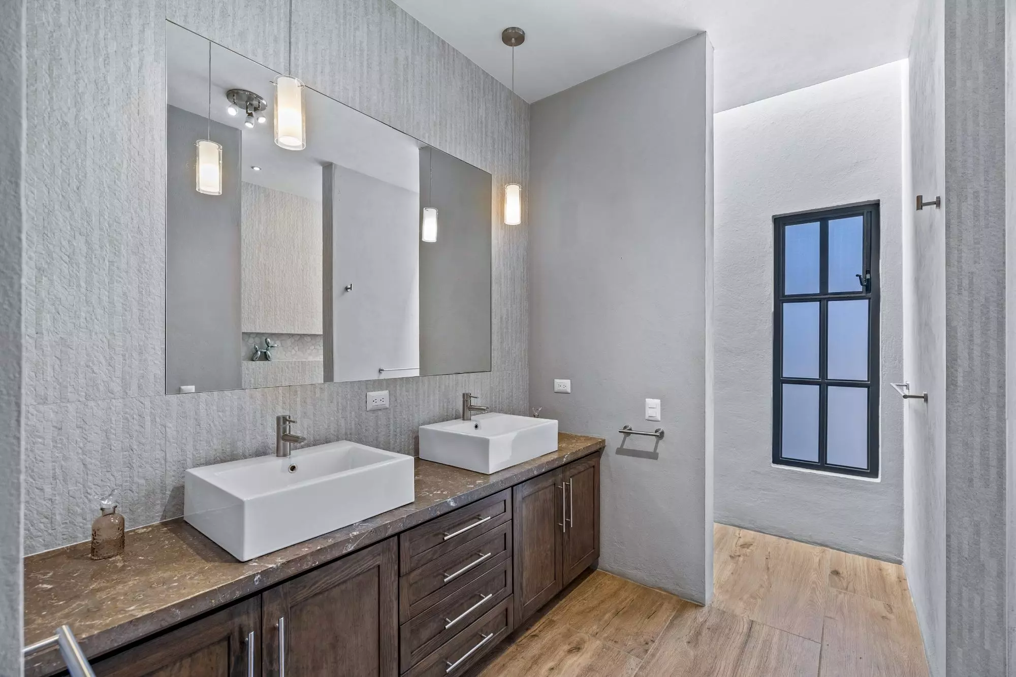 Casa San Uriel — El Paraiso, San Miguel de Allende — photo 23 — spa-inspired dual vanity bathroom