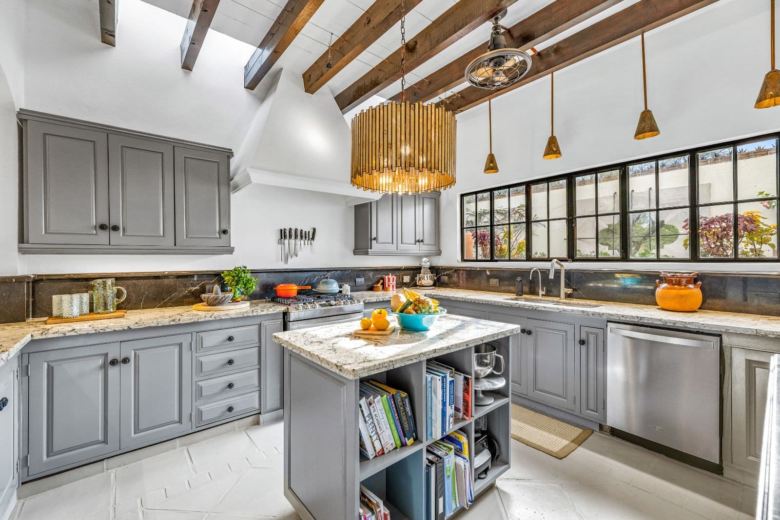 Casa CurVale — Villa de los Frailes, San Miguel de Allende — photo 9 — sunlit gourmet kitchen with exposed beams