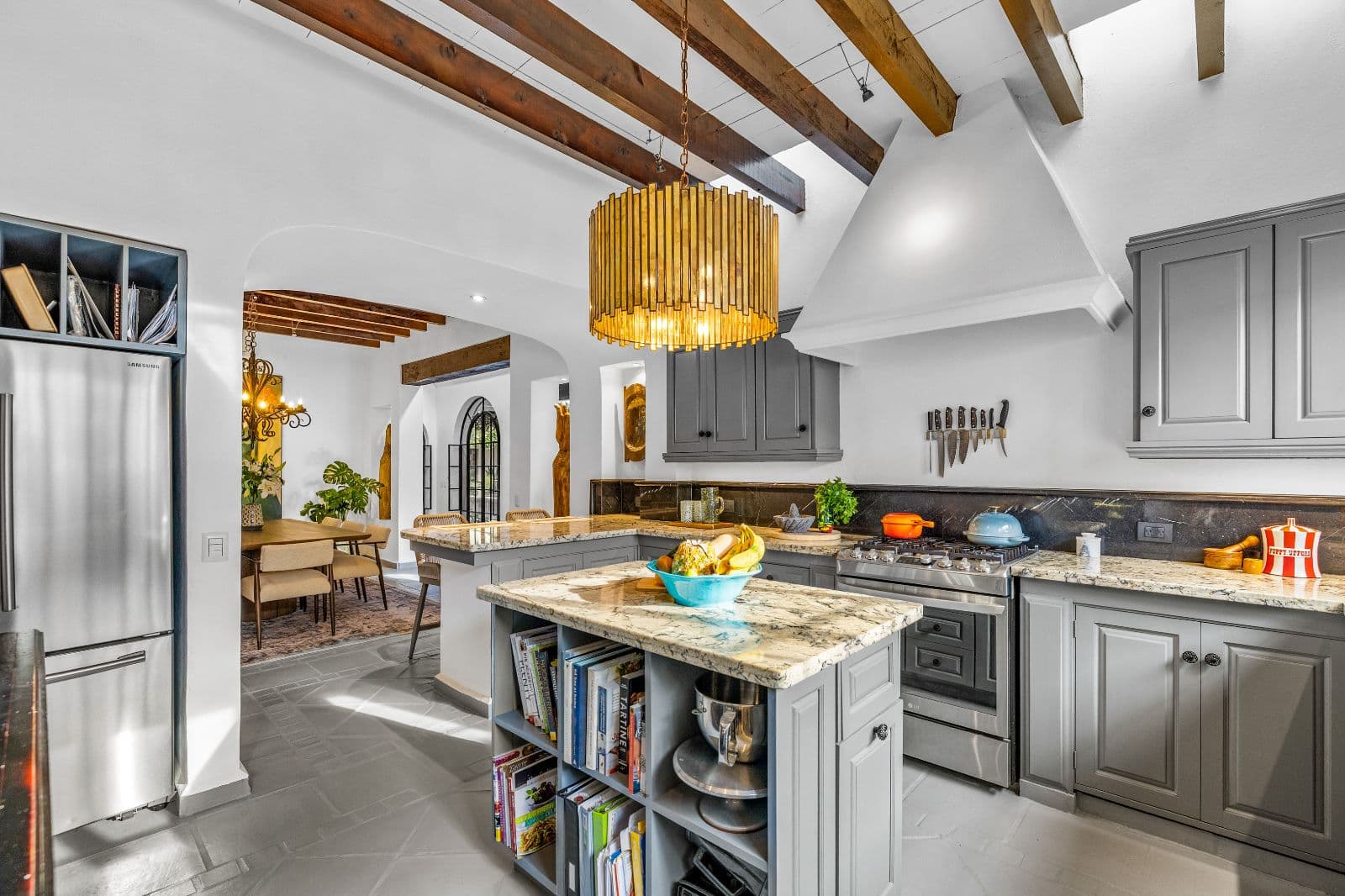 Casa CurVale — Villa de los Frailes, San Miguel de Allende — photo 10 — sophisticated chef's kitchen, soaring beams, abundant light