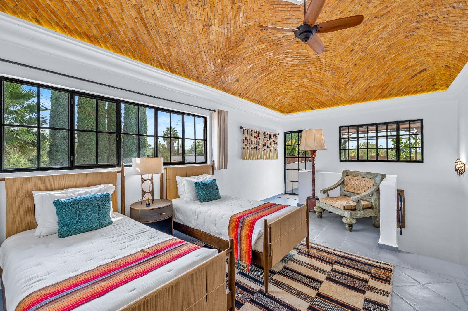 Casa CurVale — Villa de los Frailes, San Miguel de Allende — photo 12 — sun-drenched bedroom, soaring wooden ceilings