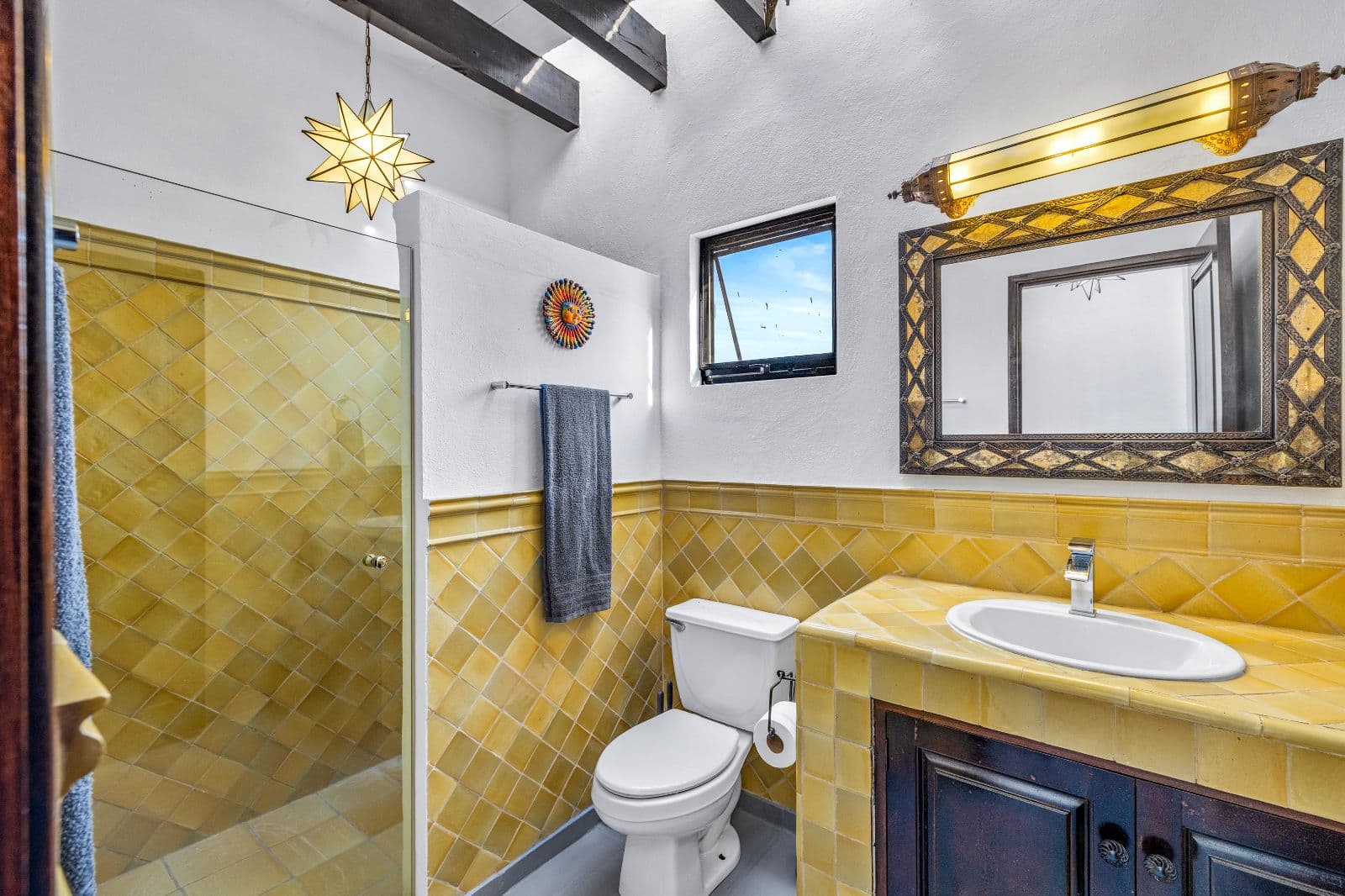 Casa CurVale — Villa de los Frailes, San Miguel de Allende — photo 14 — golden mexican tile master bath sanctuary
