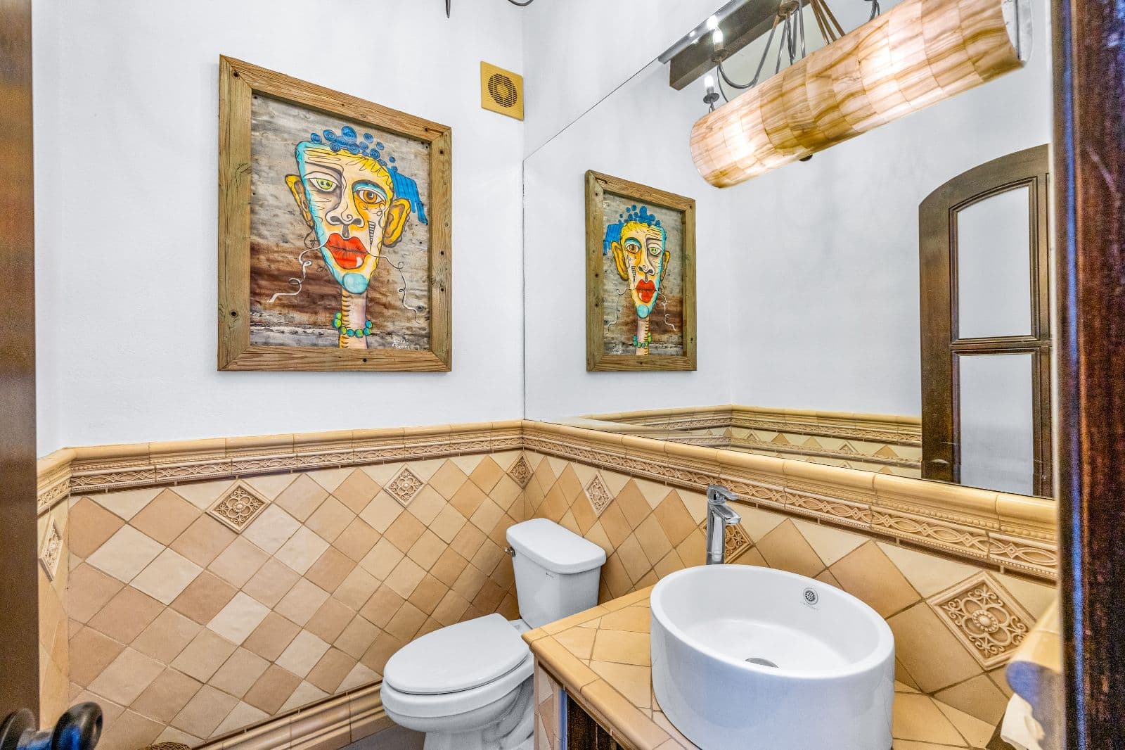 Casa CurVale — Villa de los Frailes, San Miguel de Allende — photo 11 — artistically appointed powder room masterpiece