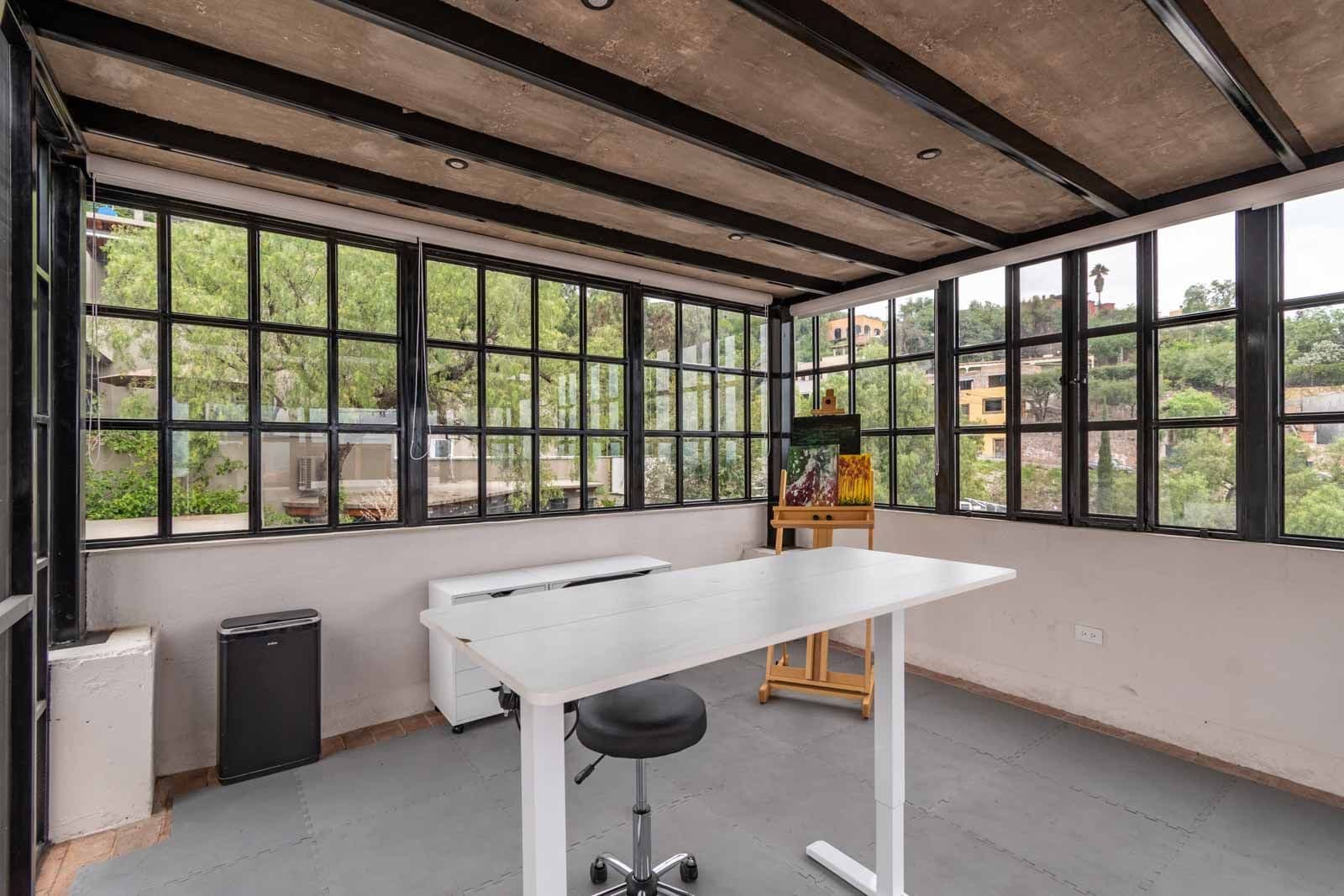 Casa de Luz — Ojo de Agua, San Miguel de Allende — photo 22 — light-filled studio with verdant views