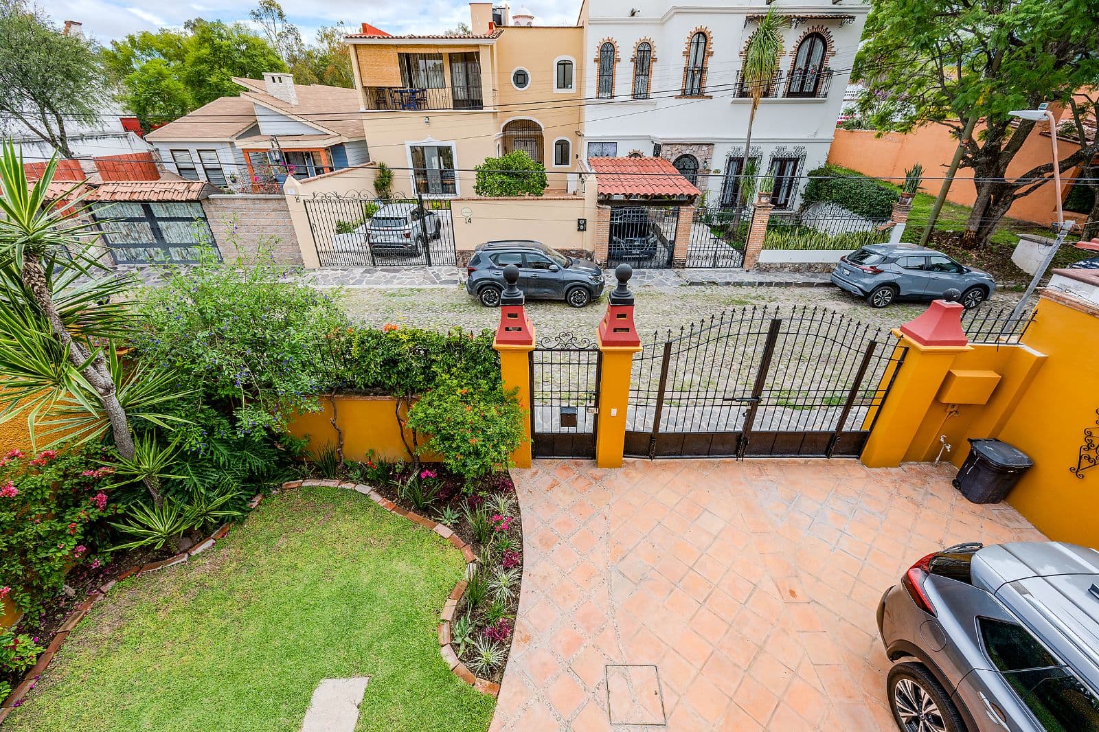 Casa Colorida — Villa de los Frailes, San Miguel de Allende — photo 26 — vibrant courtyard with mature gardens