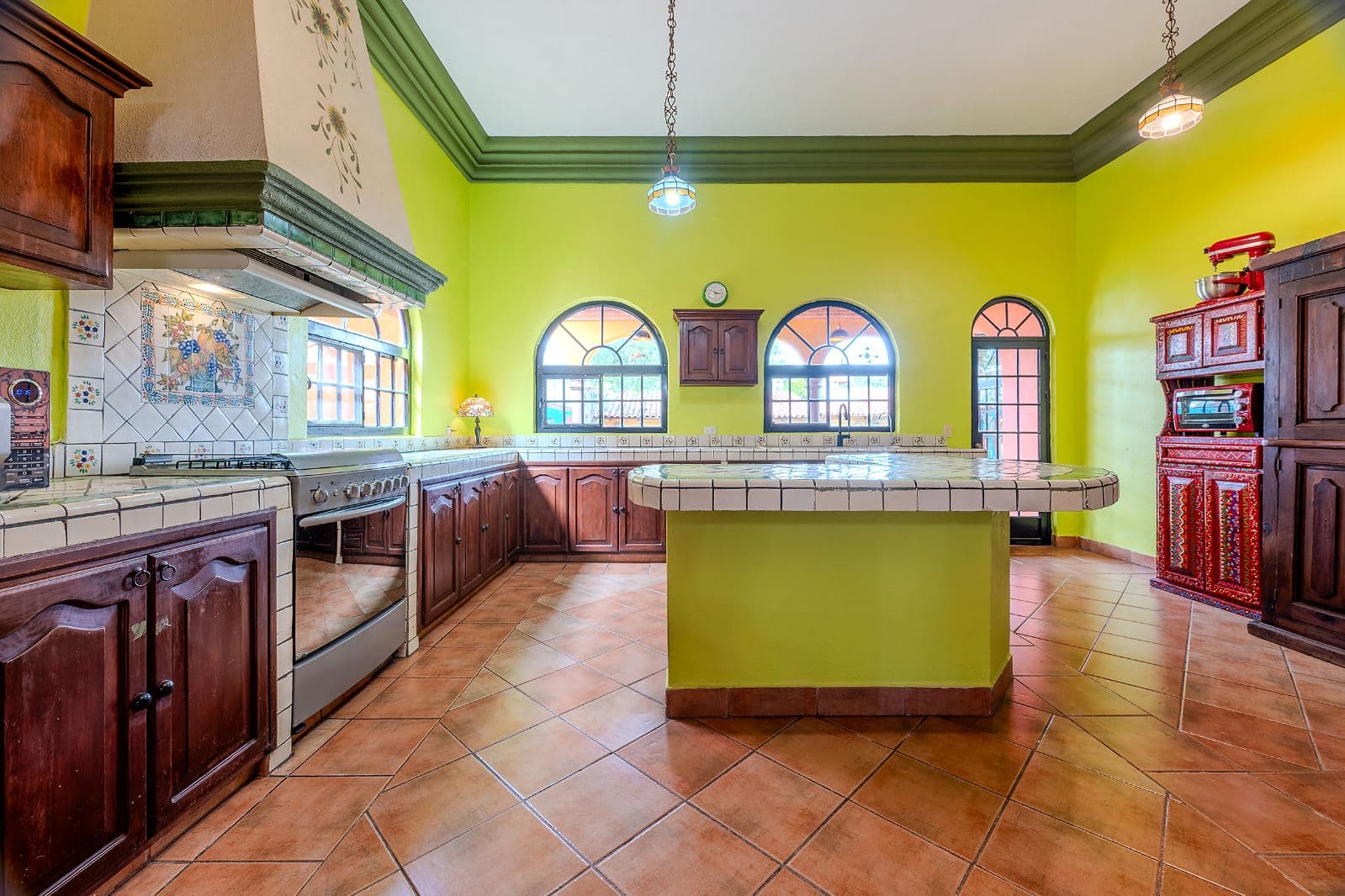 Casa Colorida — Villa de los Frailes, San Miguel de Allende — photo 9 — vibrant traditional mexican kitchen masterpiece