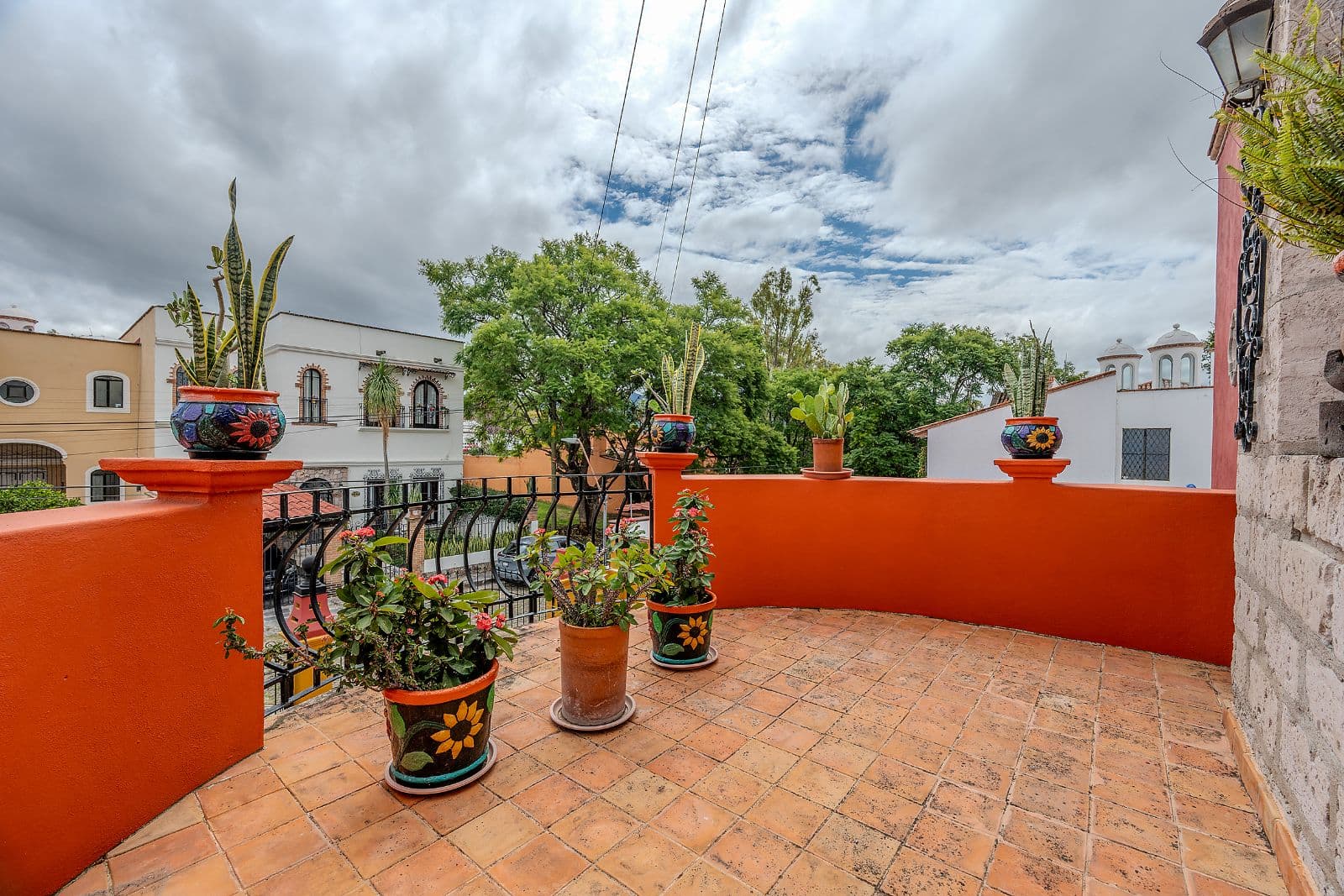Casa Colorida — Villa de los Frailes, San Miguel de Allende — photo 19 — vibrant terracotta courtyard with authentic charm