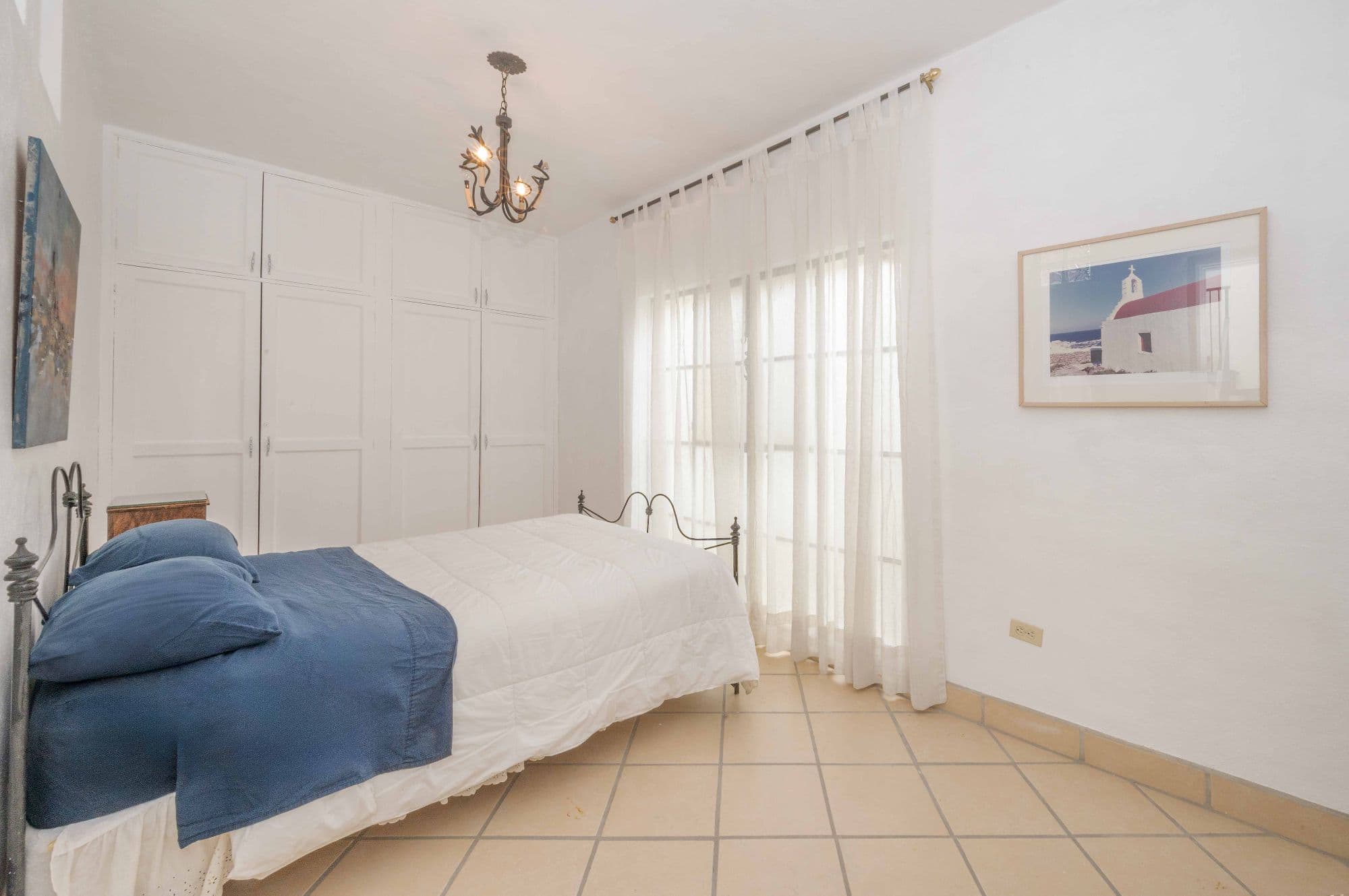 Casa Azul Escondida — San Antonio, San Miguel de Allende — photo 12 — serene mediterranean bedroom with abundant light