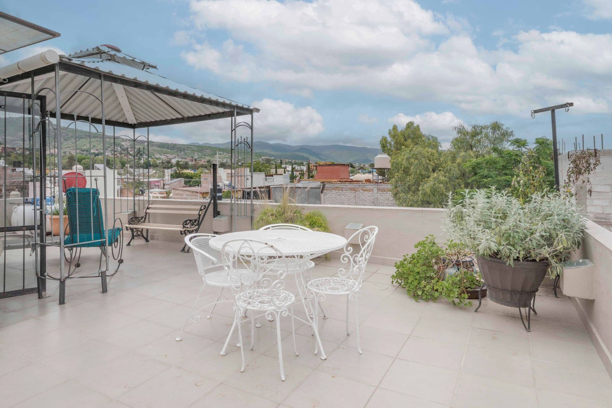 Casa Azul Escondida — San Antonio, San Miguel de Allende — photo 14 — panoramic rooftop terrace with mountain views