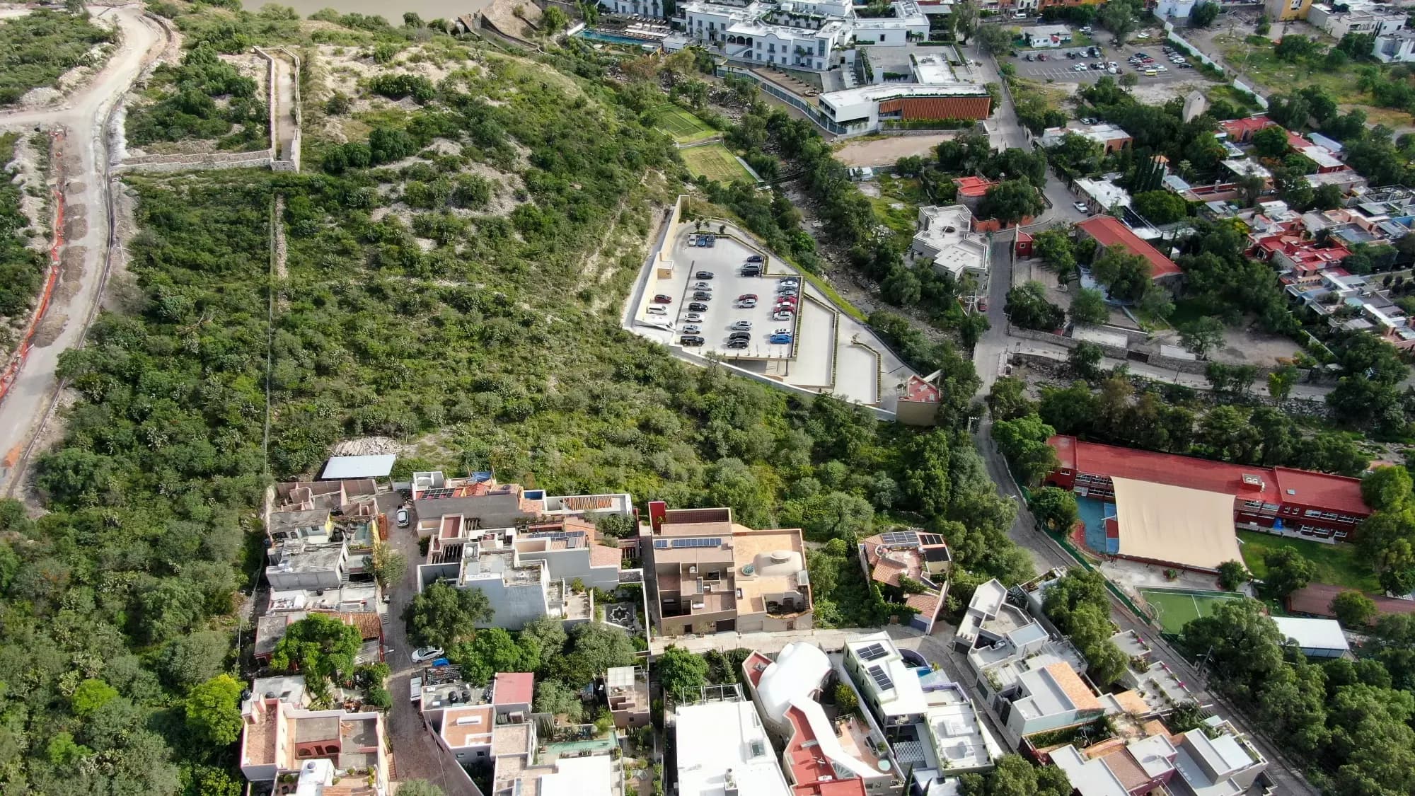 ALVA Lot 4 — El Obraje, San Miguel de Allende — photo 2 — hillside sanctuary with lush surroundings