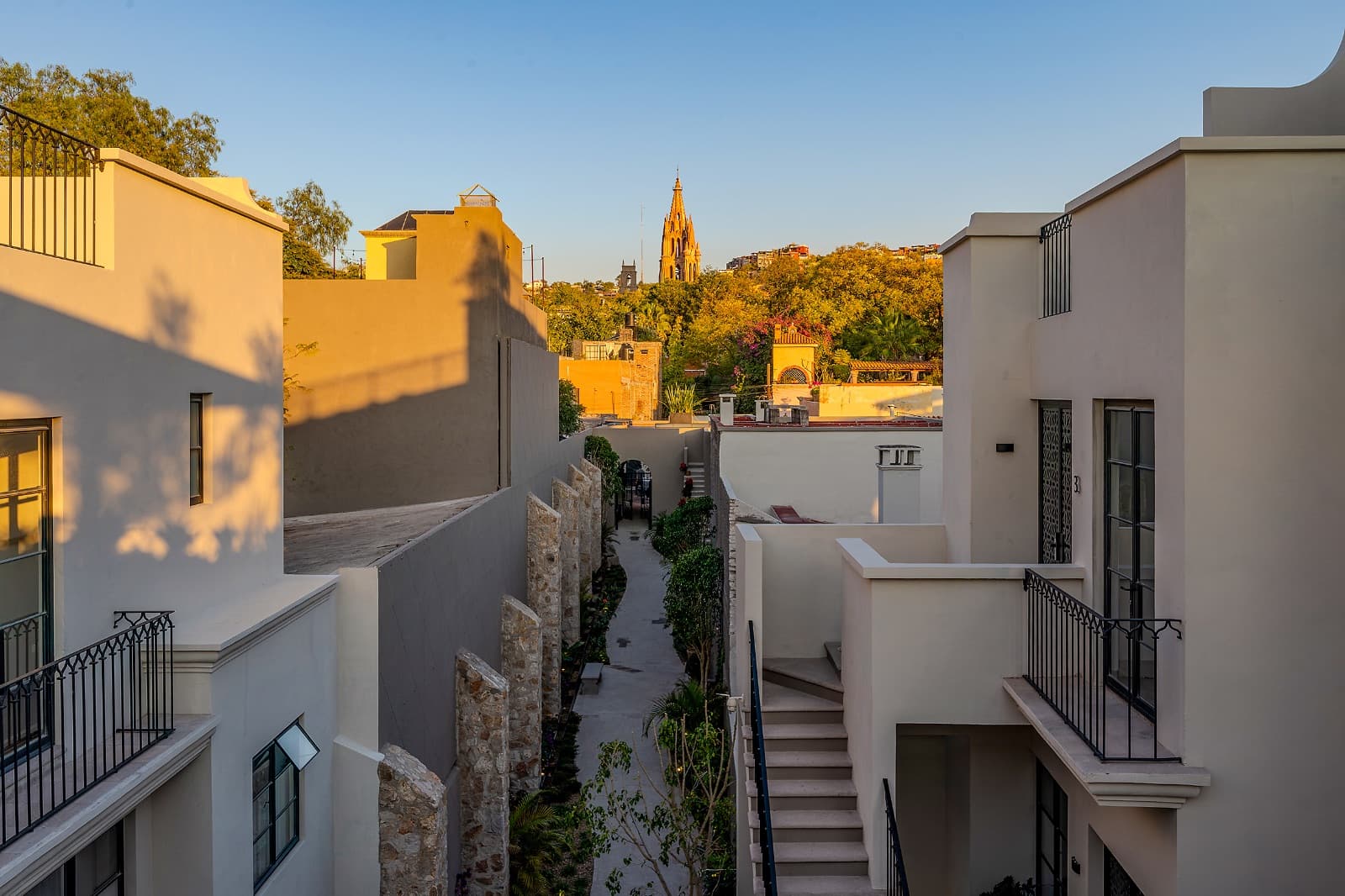 3 · Luxury Penthouse 2 Bedrooms with Private Rooftop - Paseo del Centro — Centro, San Miguel de Allende — photo 18 — golden light, colonial charm, panoramic vistas