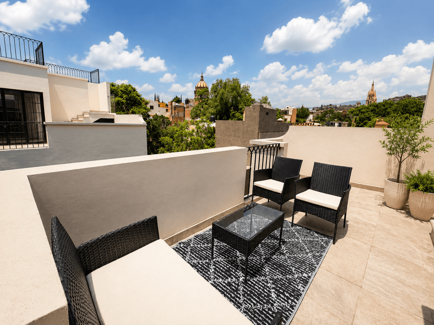 3 · Luxury Penthouse 2 Bedrooms with Private Rooftop - Paseo del Centro — Centro, San Miguel de Allende — photo 2 — elevated terrace with panoramic colonial views