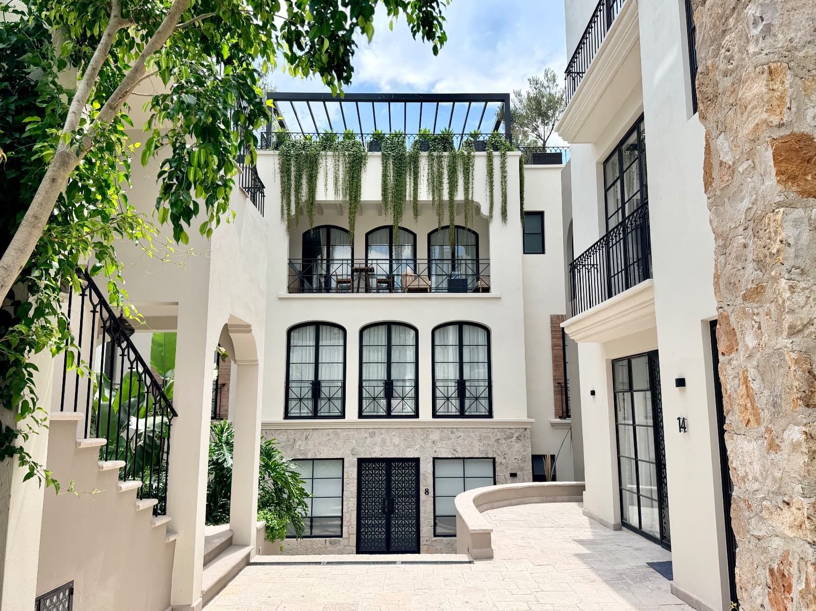 3 · Luxury Penthouse 2 Bedrooms with Private Rooftop - Paseo del Centro — Centro, San Miguel de Allende — photo 17 — contemporary courtyard oasis, cascading greenery elegance