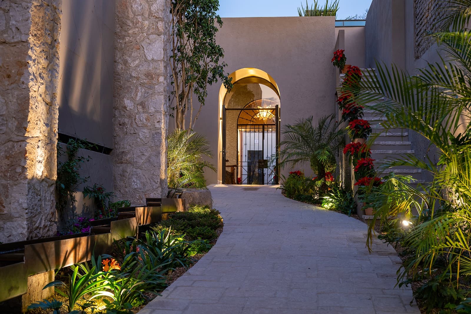 3 · Luxury Penthouse 2 Bedrooms with Private Rooftop - Paseo del Centro — Centro, San Miguel de Allende — photo 20 — enchanting courtyard, architectural elegance glows