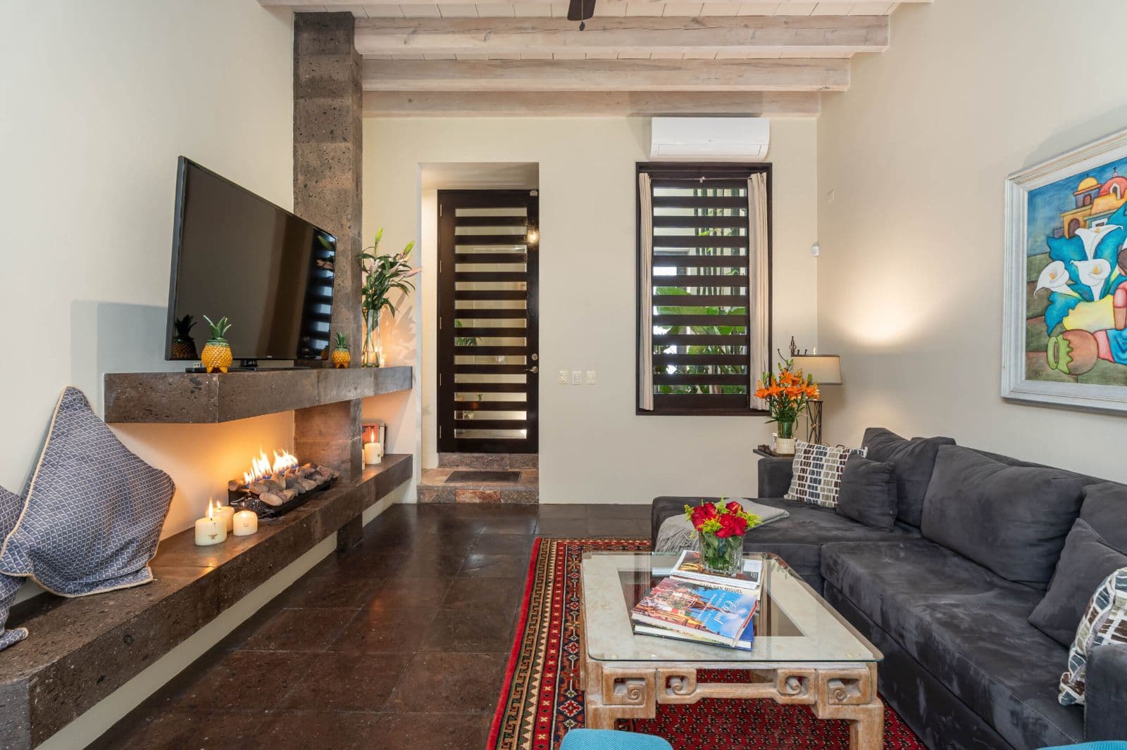 Casa Lagniappe — Centro, San Miguel de Allende — photo 5 — sophisticated fireplace, warm ambient elegance