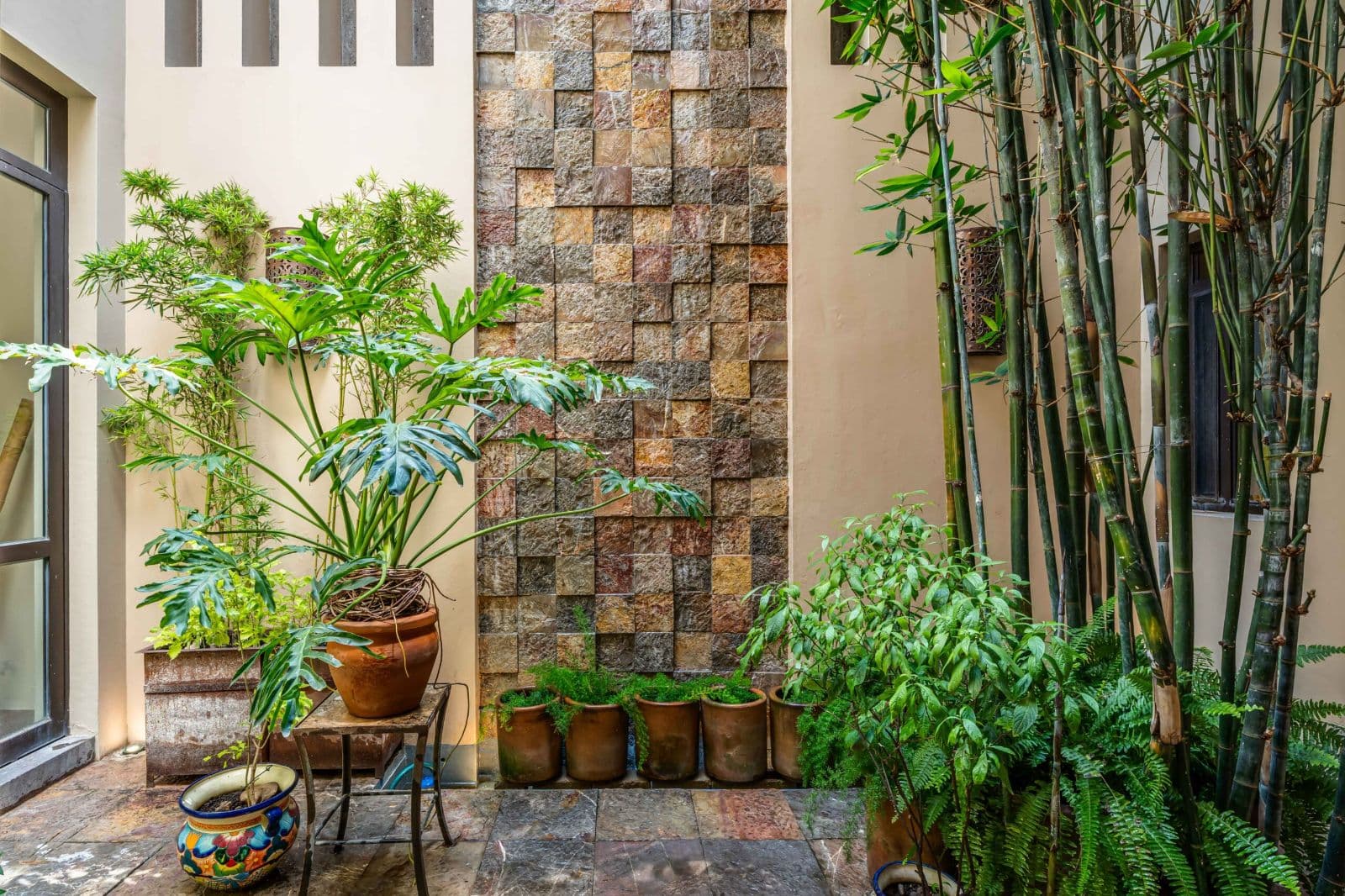 Casa Lagniappe — Centro, San Miguel de Allende — photo 7 — serene courtyard with rustic stone elegance