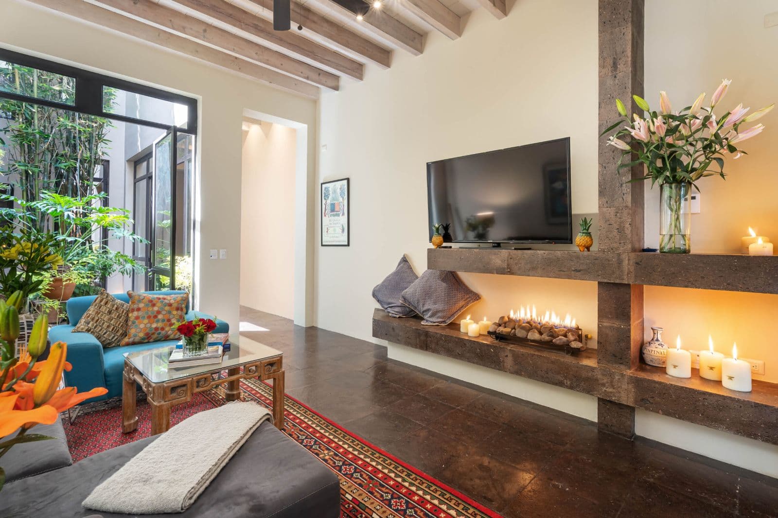 Casa Lagniappe — Centro, San Miguel de Allende — photo 6 — modern luxury living with fireplace warmth