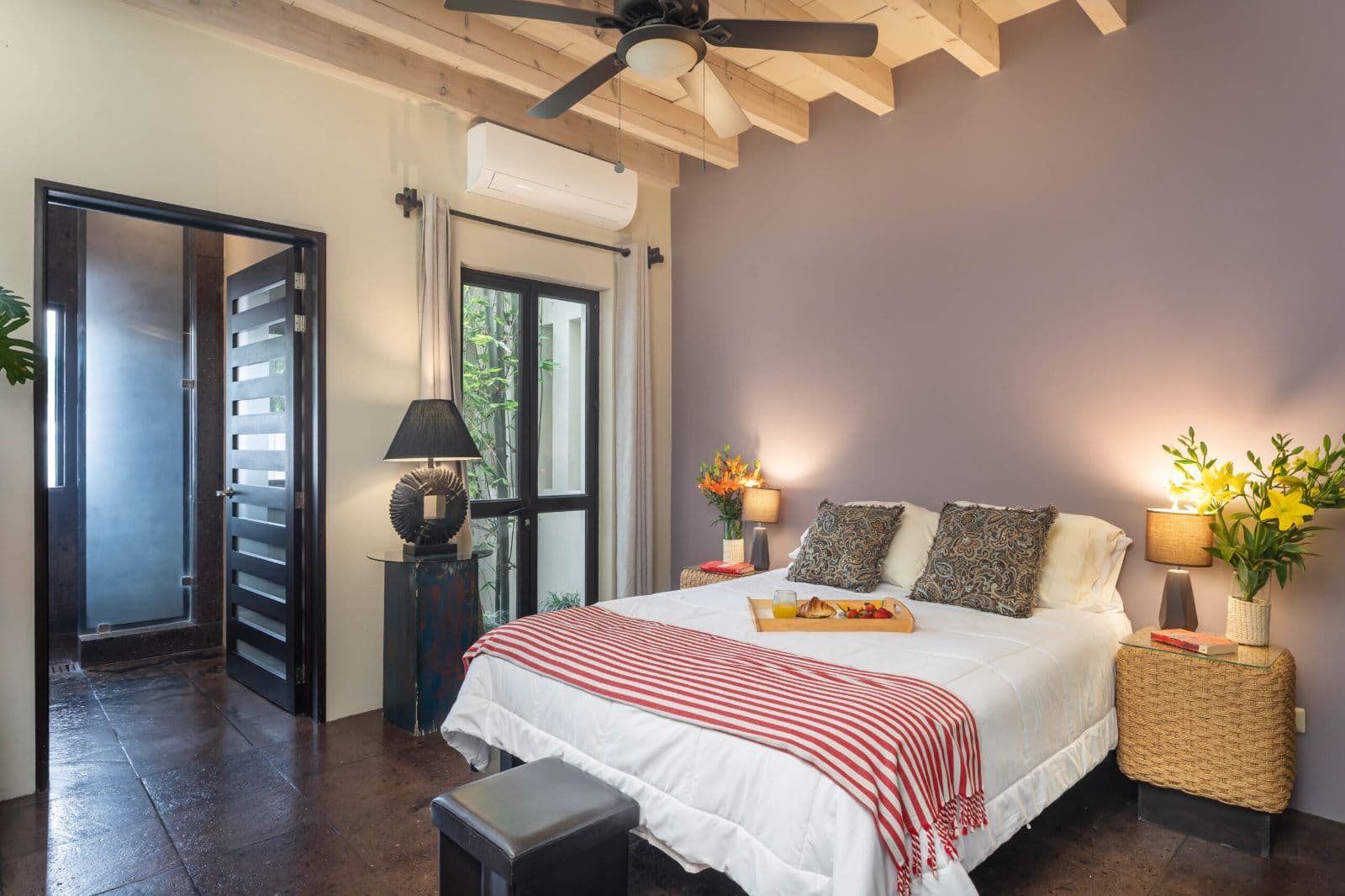 Casa Lagniappe — Centro, San Miguel de Allende — photo 15 — serene master suite, exposed beams, garden views