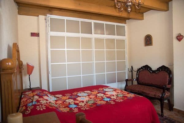 CASA AGAVE — Villa de los Frailes, San Miguel de Allende — photo 4 — rustic charm bedroom with natural light