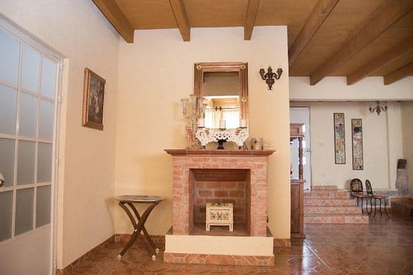 CASA AGAVE — Villa de los Frailes, San Miguel de Allende — photo 10 — charming fireplace, rustic brick elegance