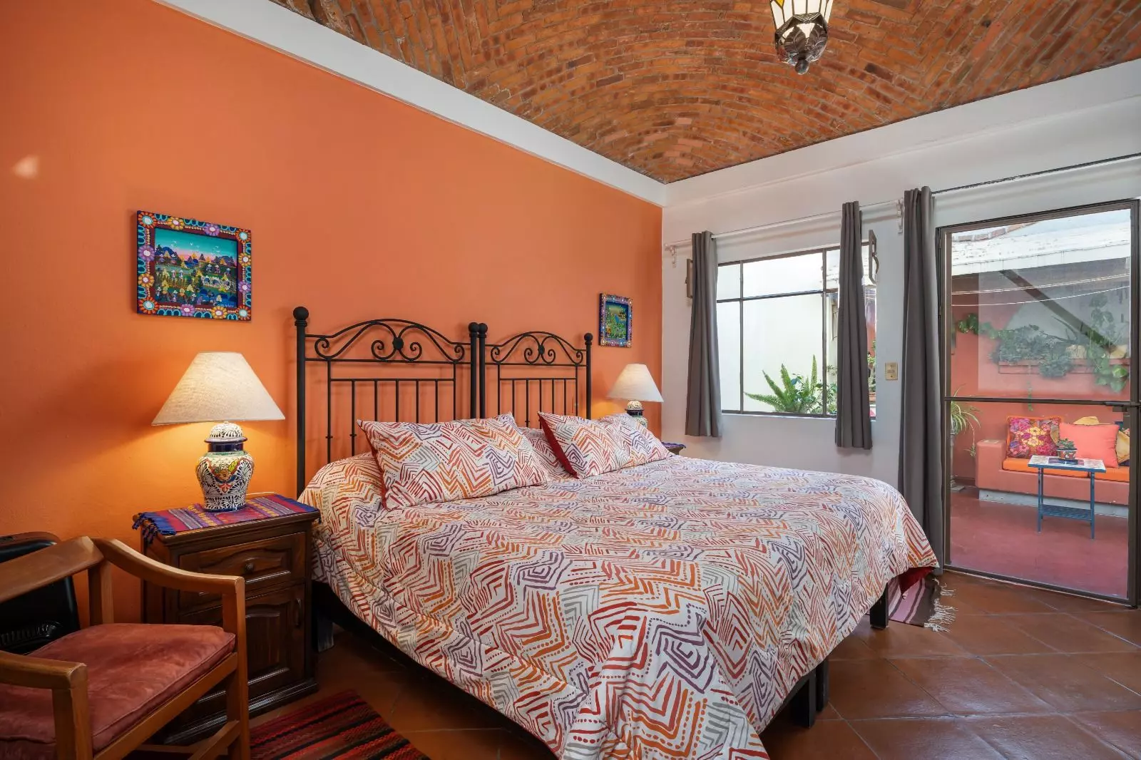 Casita Guadiana — Guadiana, San Miguel de Allende — photo 10 — vibrant master suite, exposed brick charm