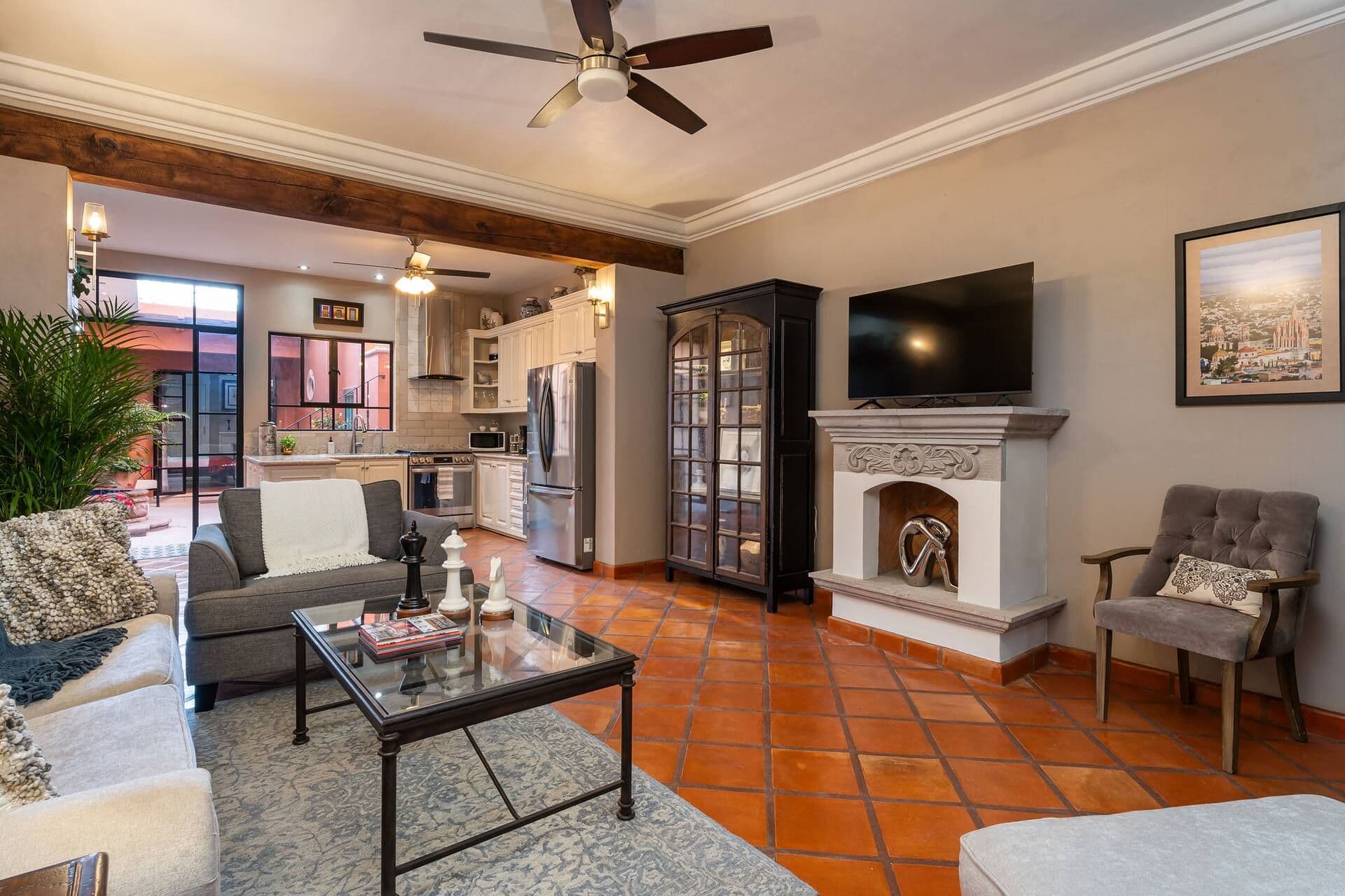 Casa Mimosa — San Antonio, San Miguel de Allende — photo 2 — elegant open-plan living with sunset views