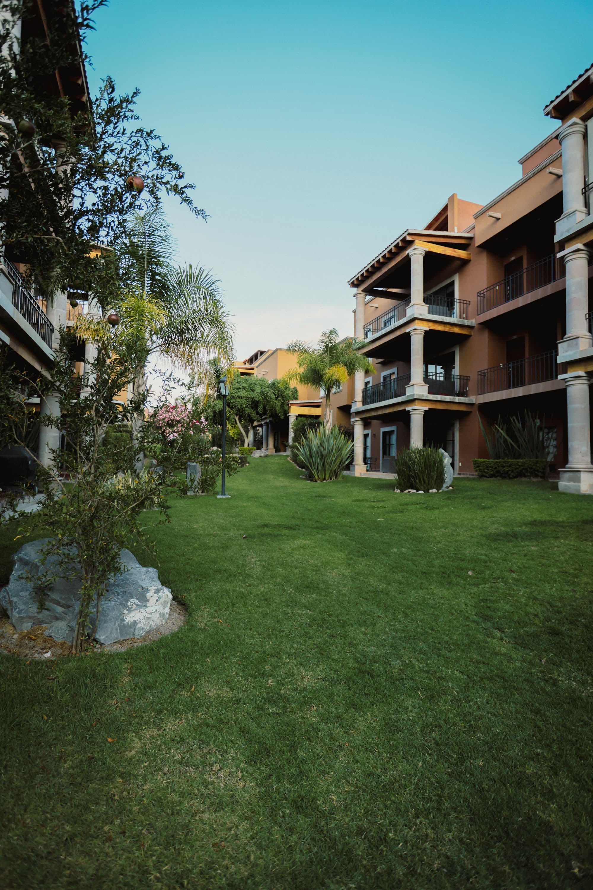 El Milagro Rooftop Apartment — San Miguel de Allende Centro, San Miguel de Allende — photo 8 — verdant courtyards embrace colonial elegance