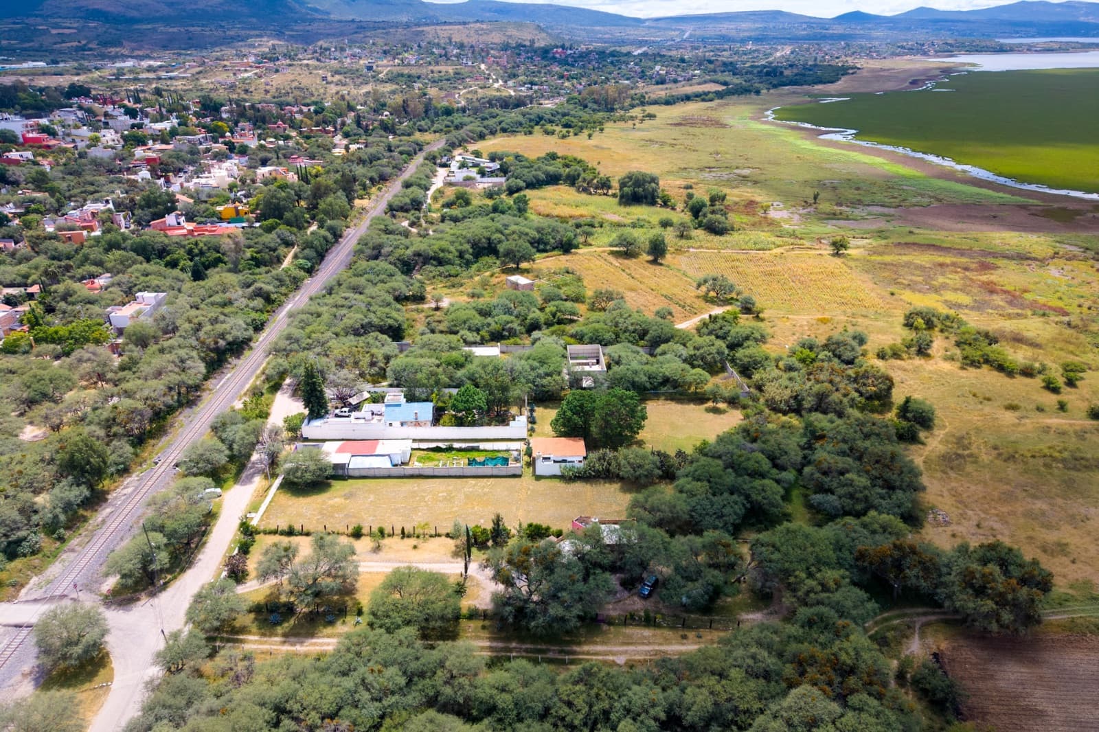 Terrenos San Miguelito de Los Frailes — Villa de los Frailes, San Miguel de Allende — photo 10 — sprawling hacienda nestled lush valley views