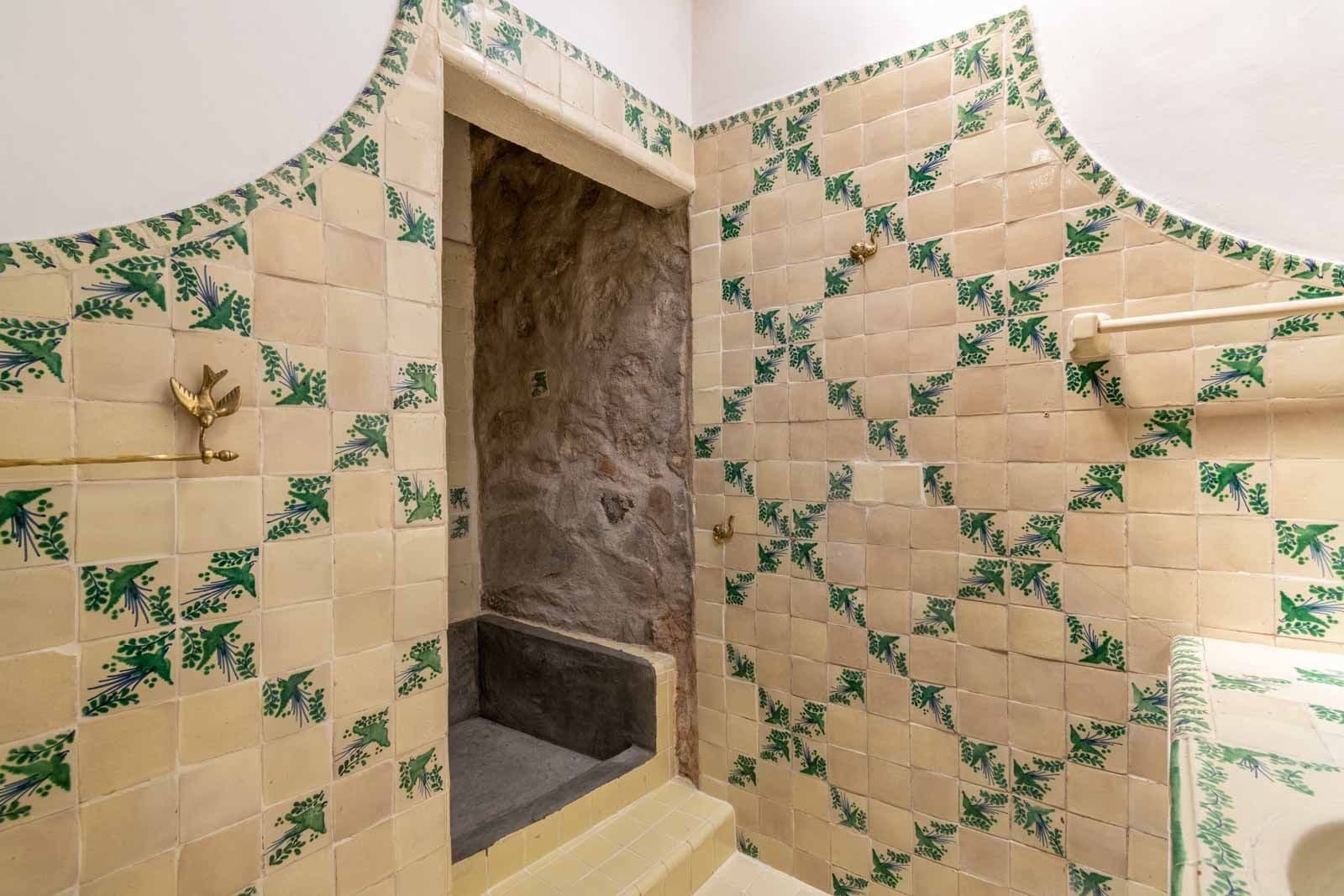 Casa Quebrada — Centro, San Miguel de Allende — photo 19 — charming traditional tiled fireplace nook